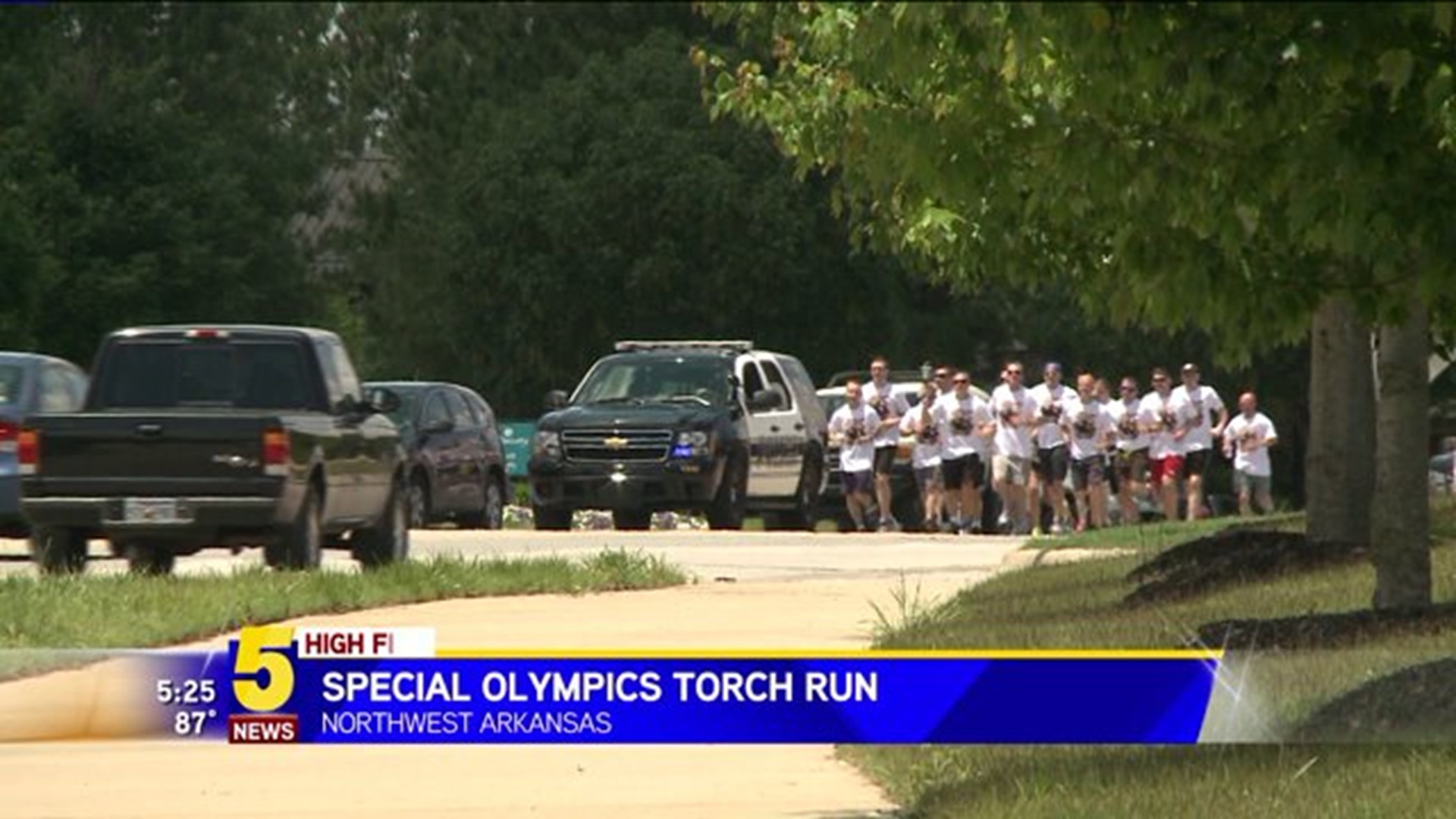 High Five: Law Enforcement Officials Participate In Special Olympics Torch Run