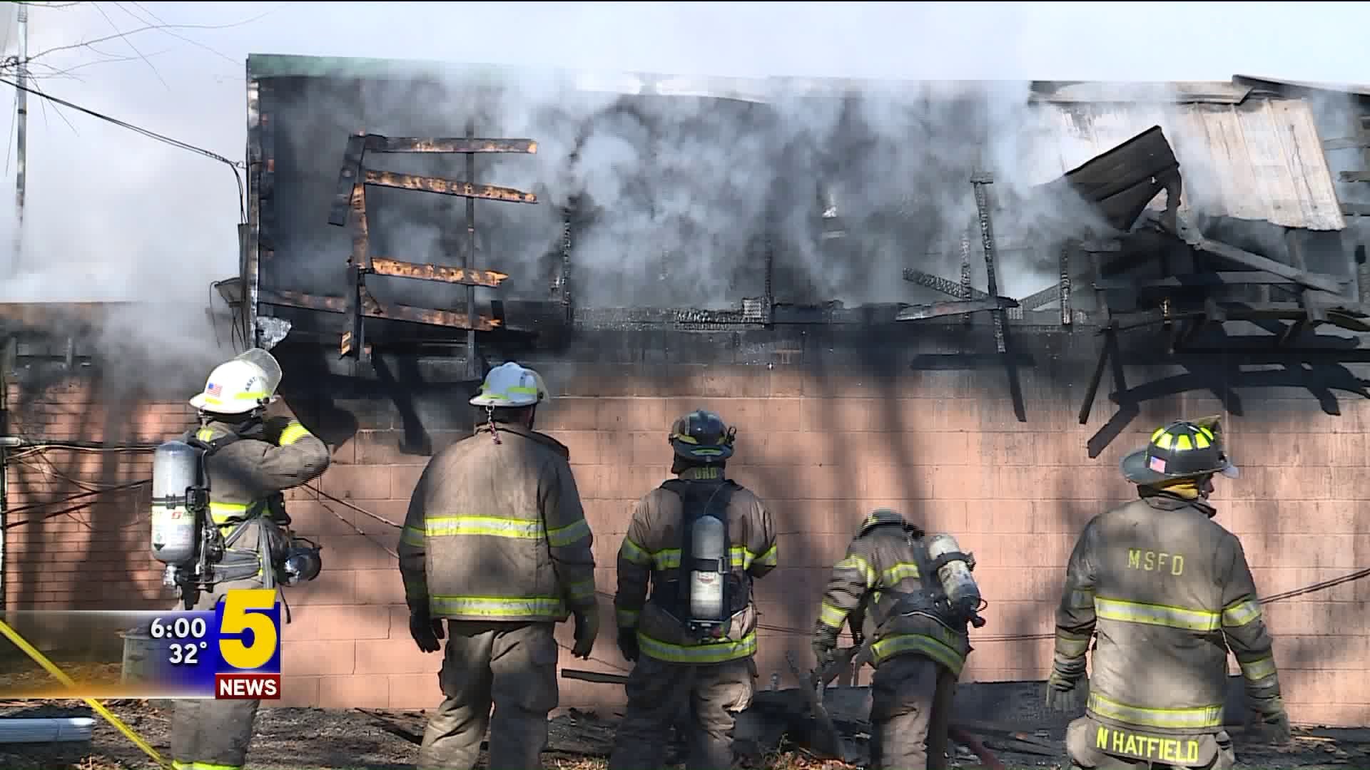Crews Battle Strip Mall Fire