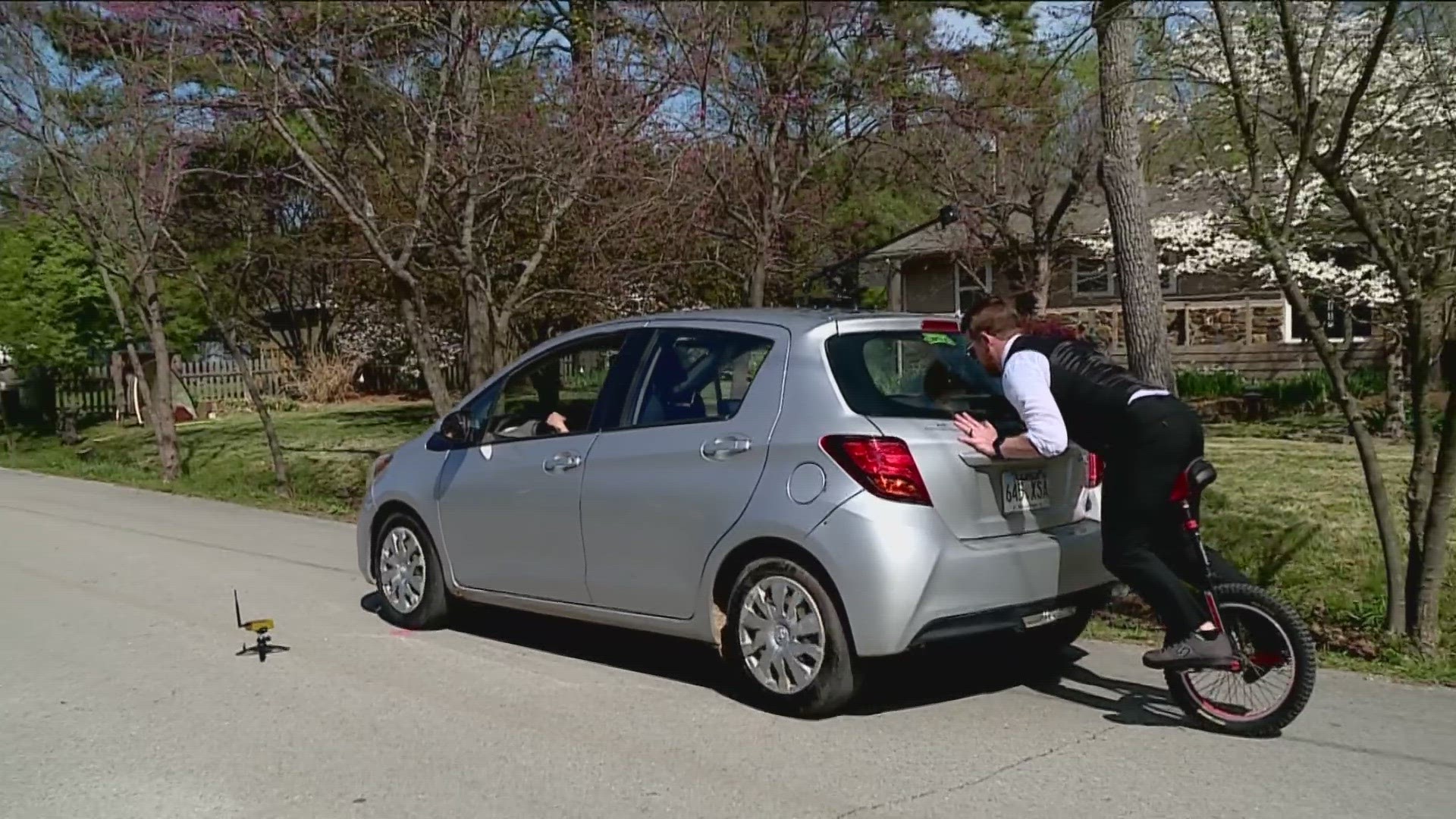 ONE FAYETTEVILLE MAN SET HIS EYES ON PUSHING A CAR 100 FEET... WHILE RIDING A UNICYCLE...