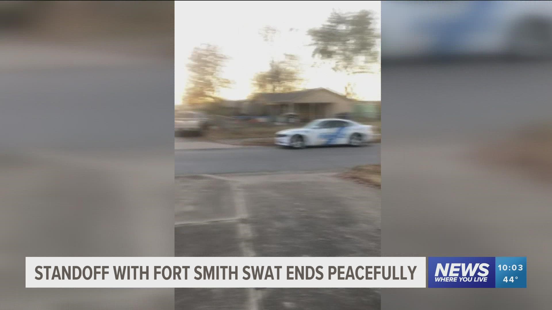 The Fort Smith SWAT team surrounded a home with a reported armed man inside.