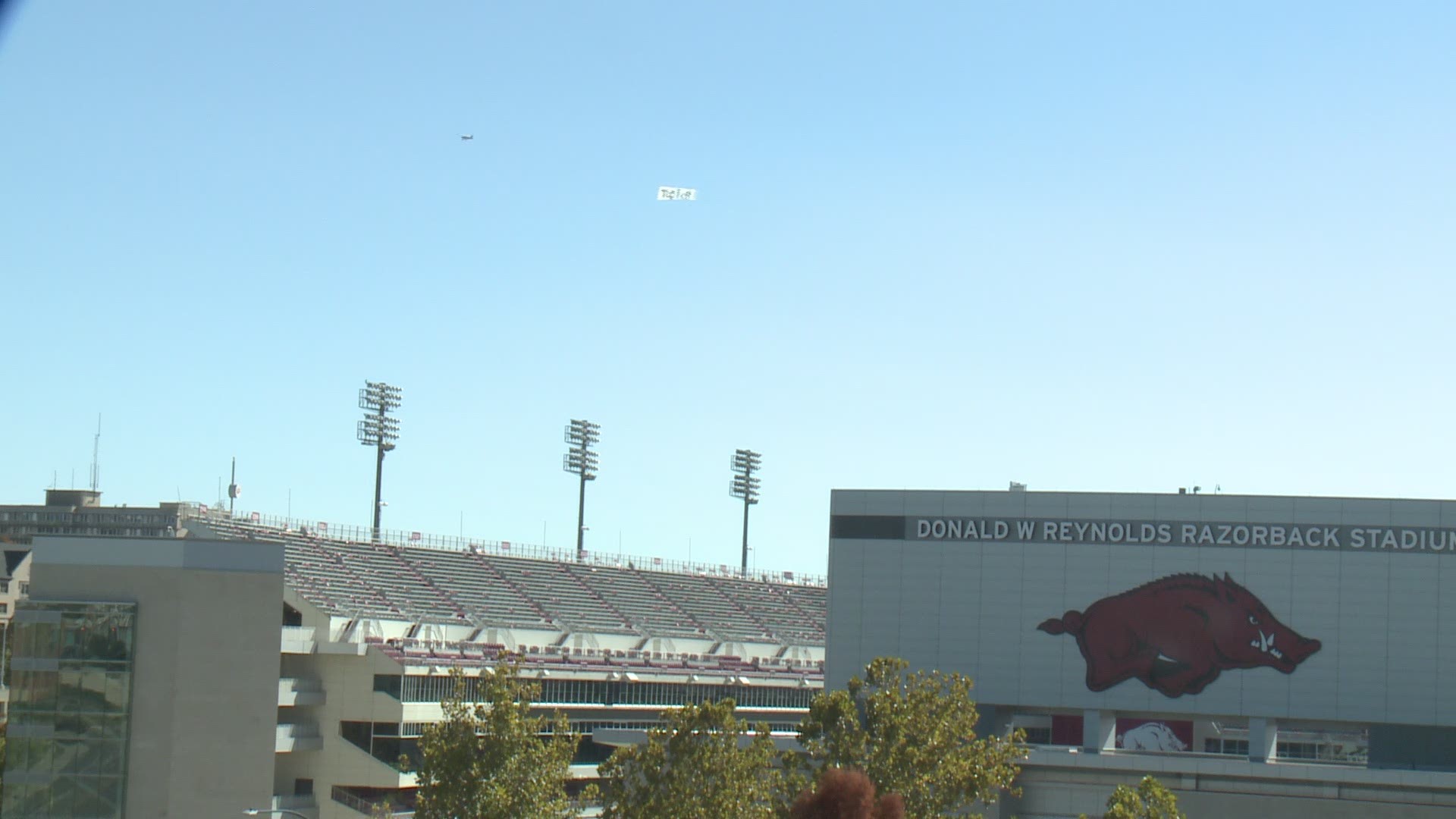 An airplane banner with the word "Together" printed on it flew over Fayetteville Monday in advance of Election Day.