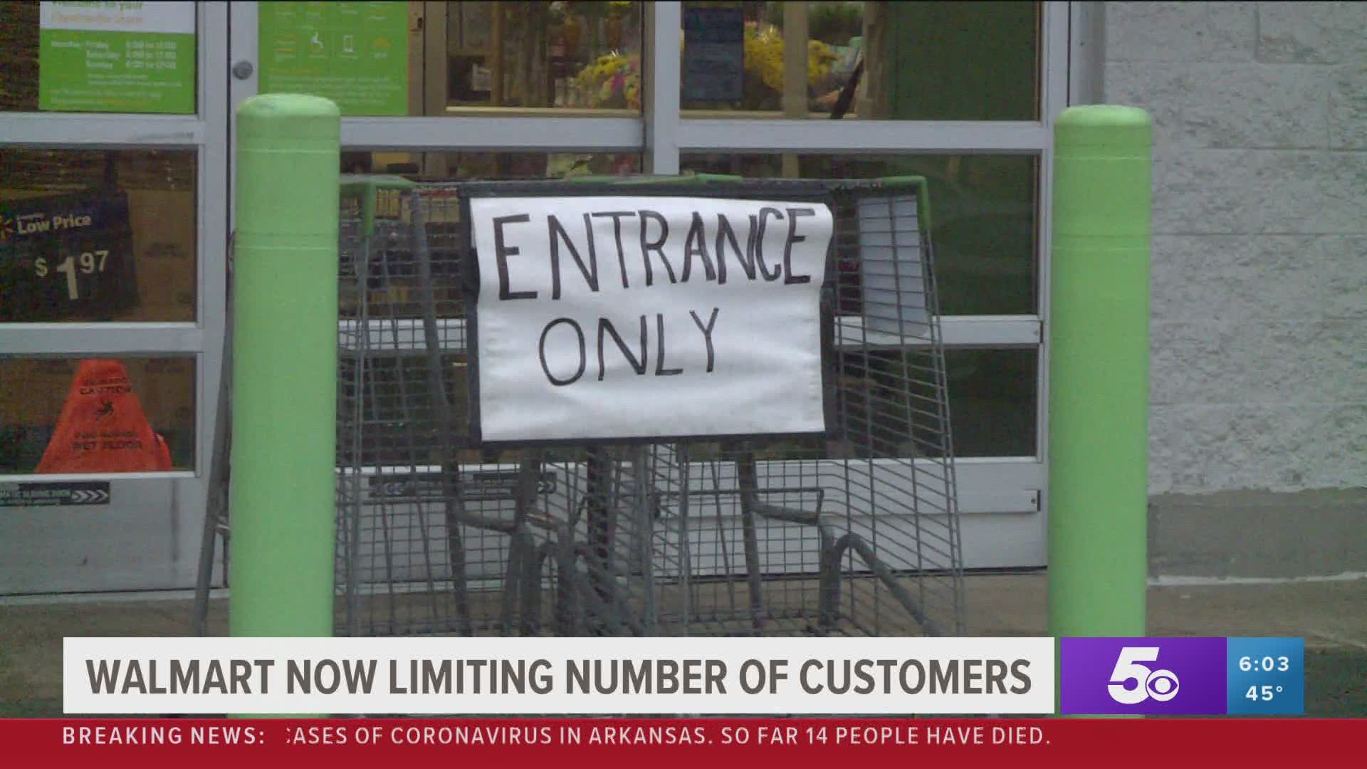 Walmart limiting number of customers in store.