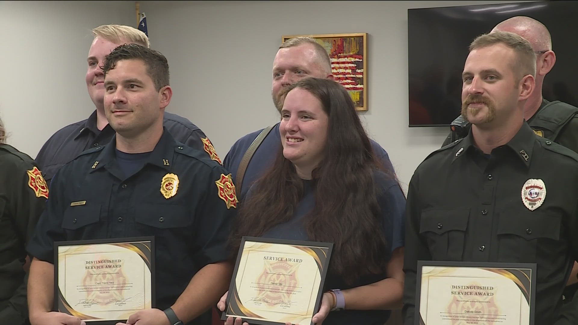 Mayor Kurt Maddox recognized 17 first responders with a Distinguished Service Award who helped rescue and treat 18 people and respond to over 1,200 calls.