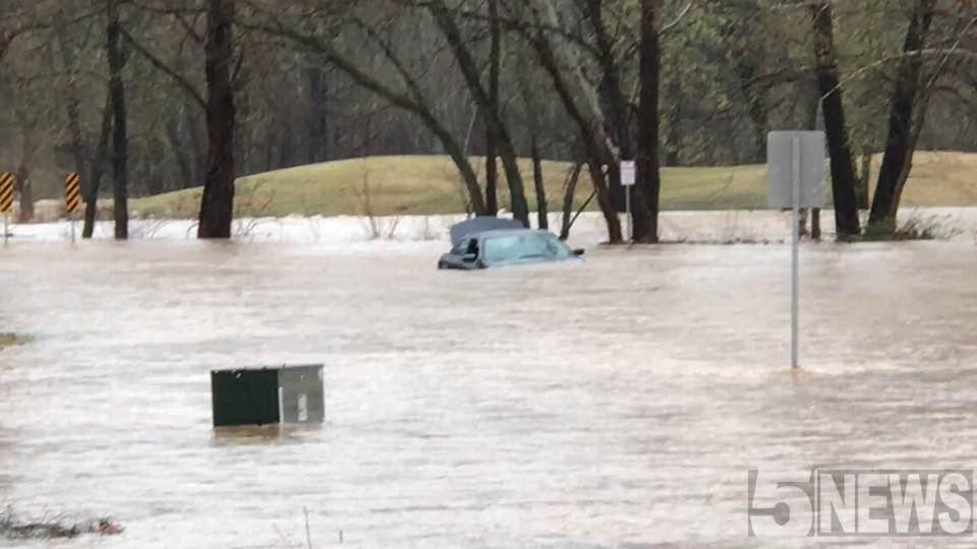 Flooded car in Bella Vista