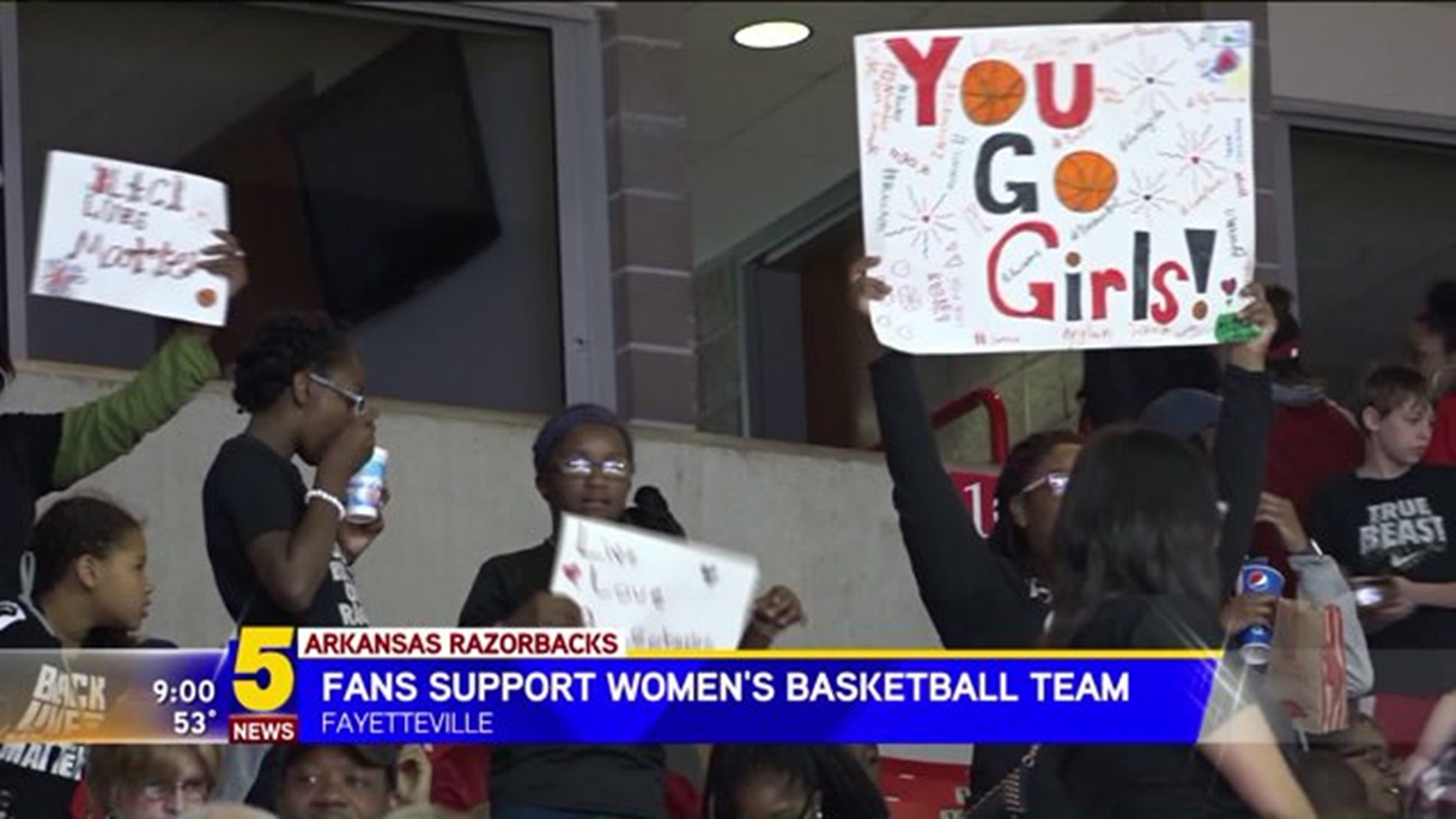 Fans Support Women`s Basketball Team