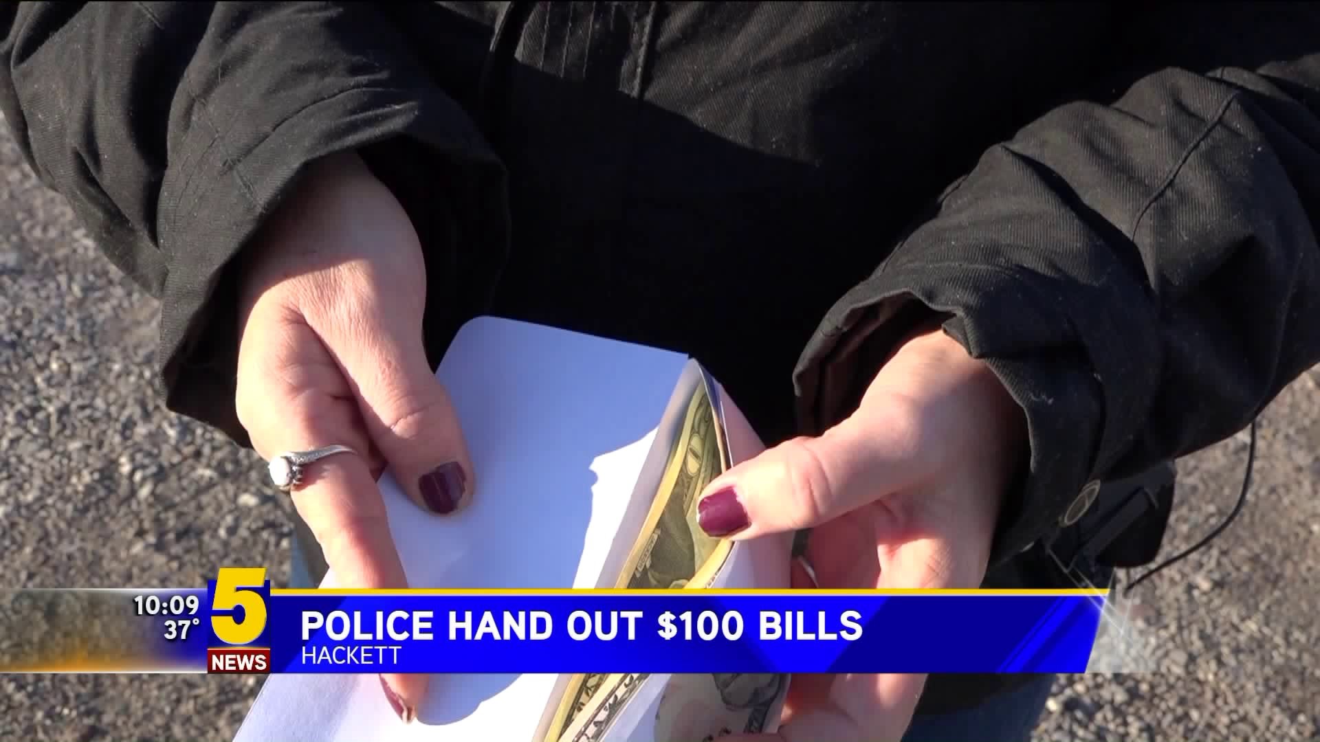 Hackett Police Hand Out $100 Bills