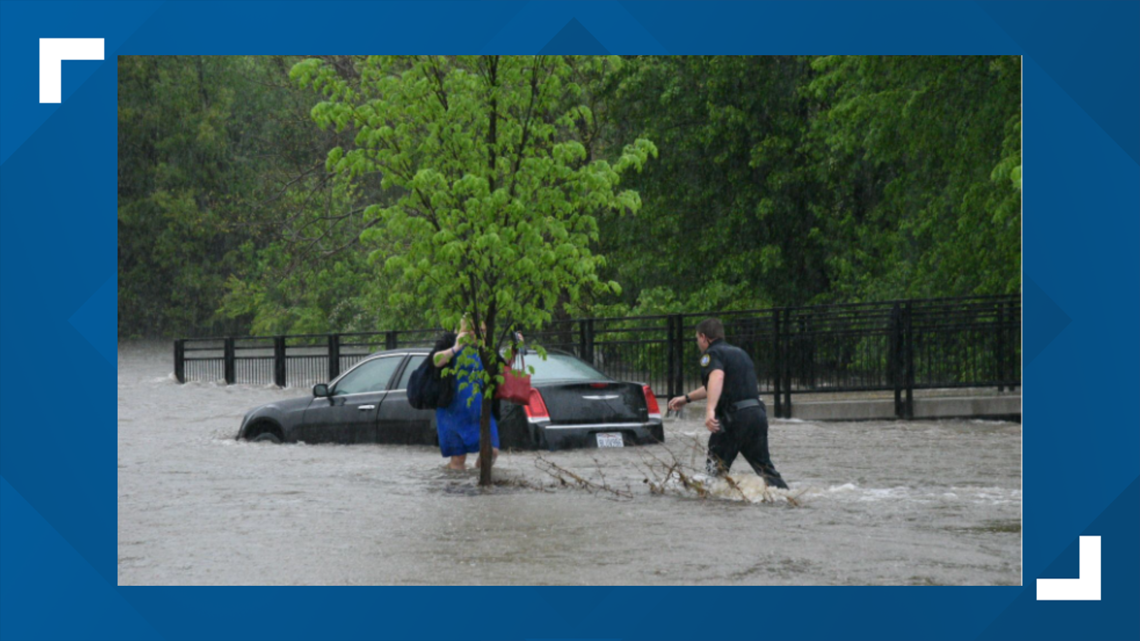 Bentonville officer helps flood victims escape from high water