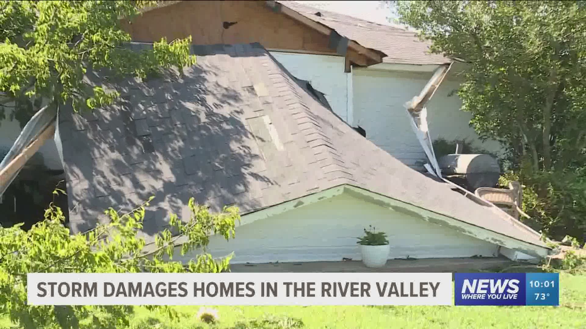 Storm damages homes in the River Valley.