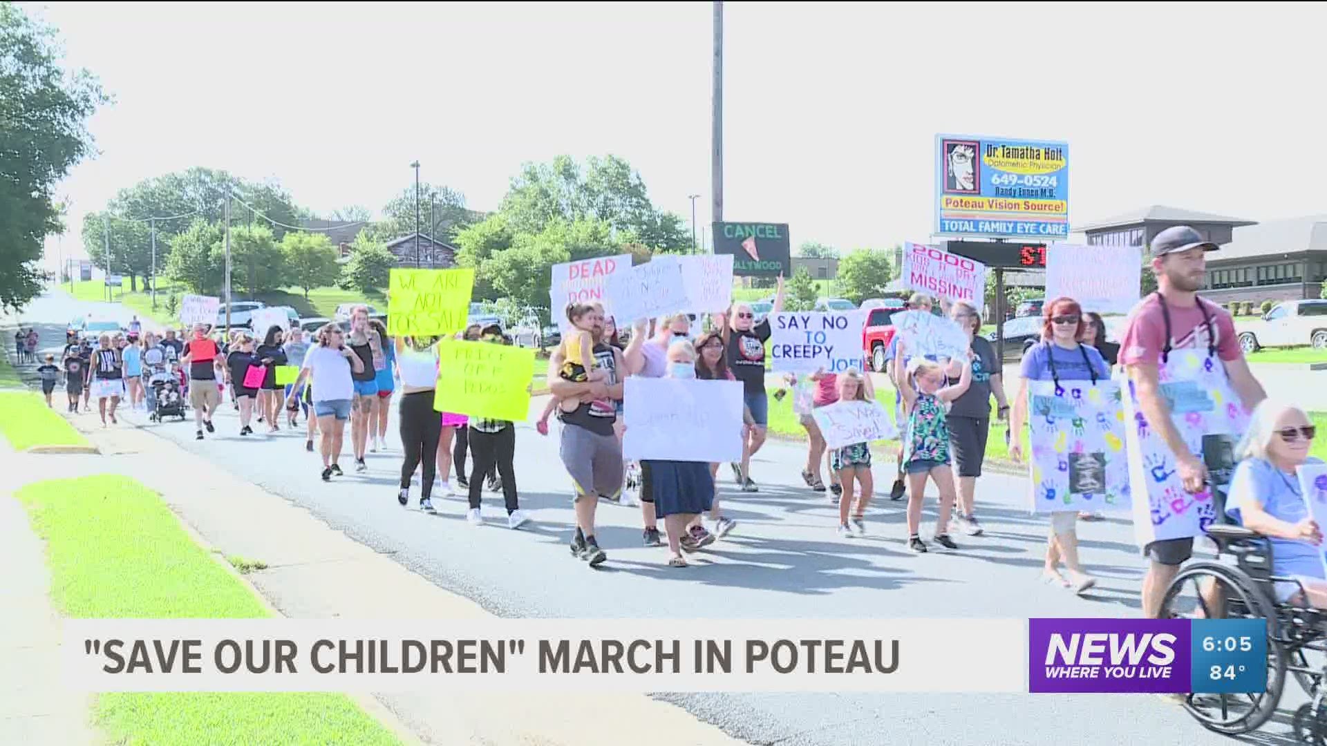 A march around the #saveourchildren movement was held in Poteau, Okla. on Saturday.