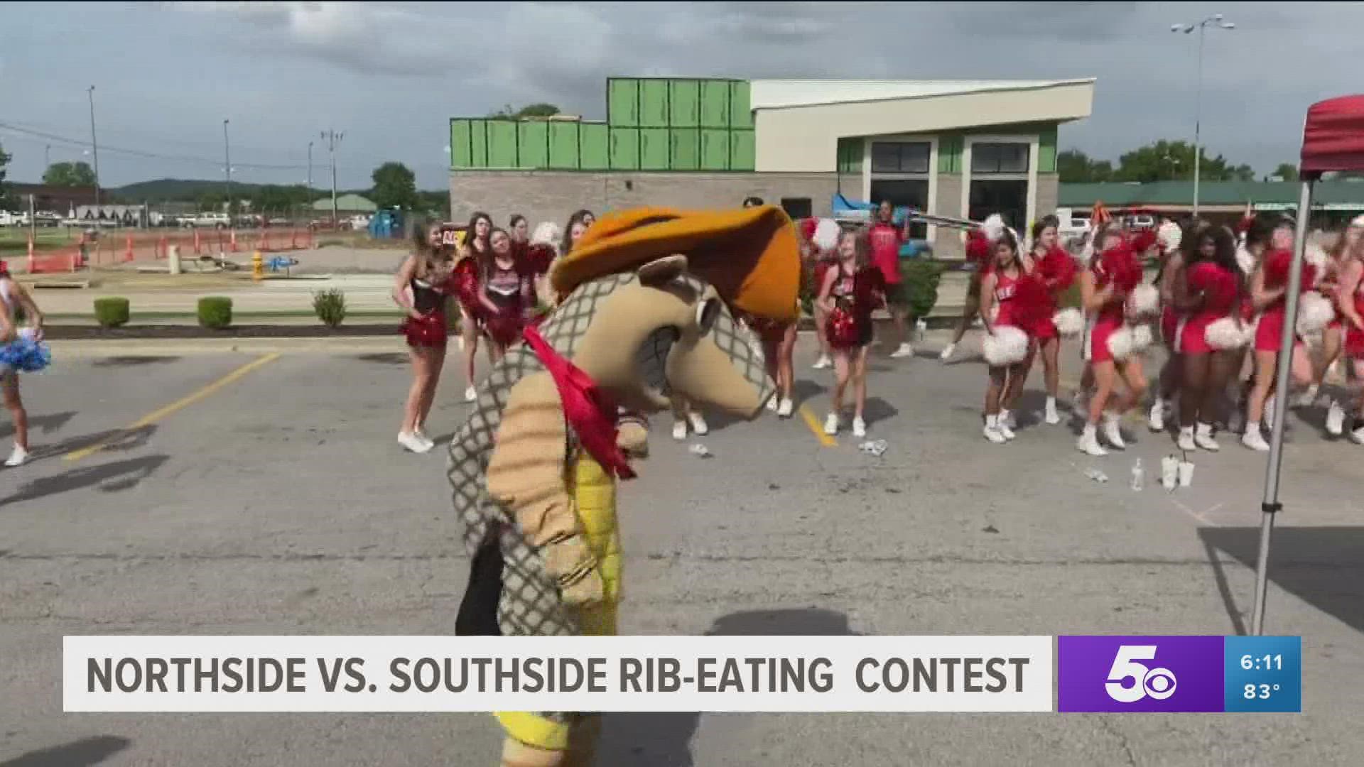 Members of the Northside and Southside football teams huddled up to raise money through a rib-eating challenge at Texas Roadhouse.