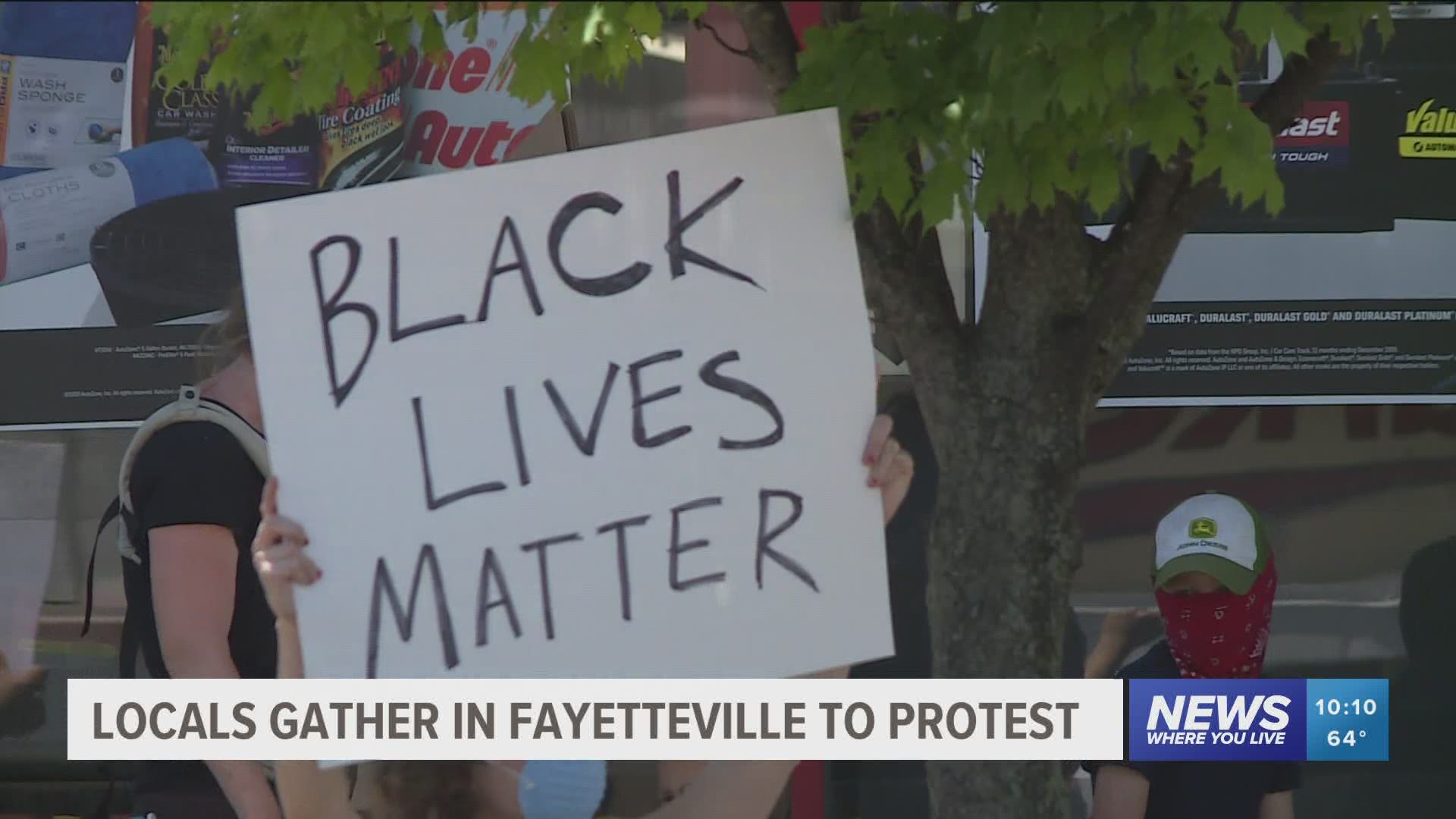 Local gather in Fayetteville to protest.