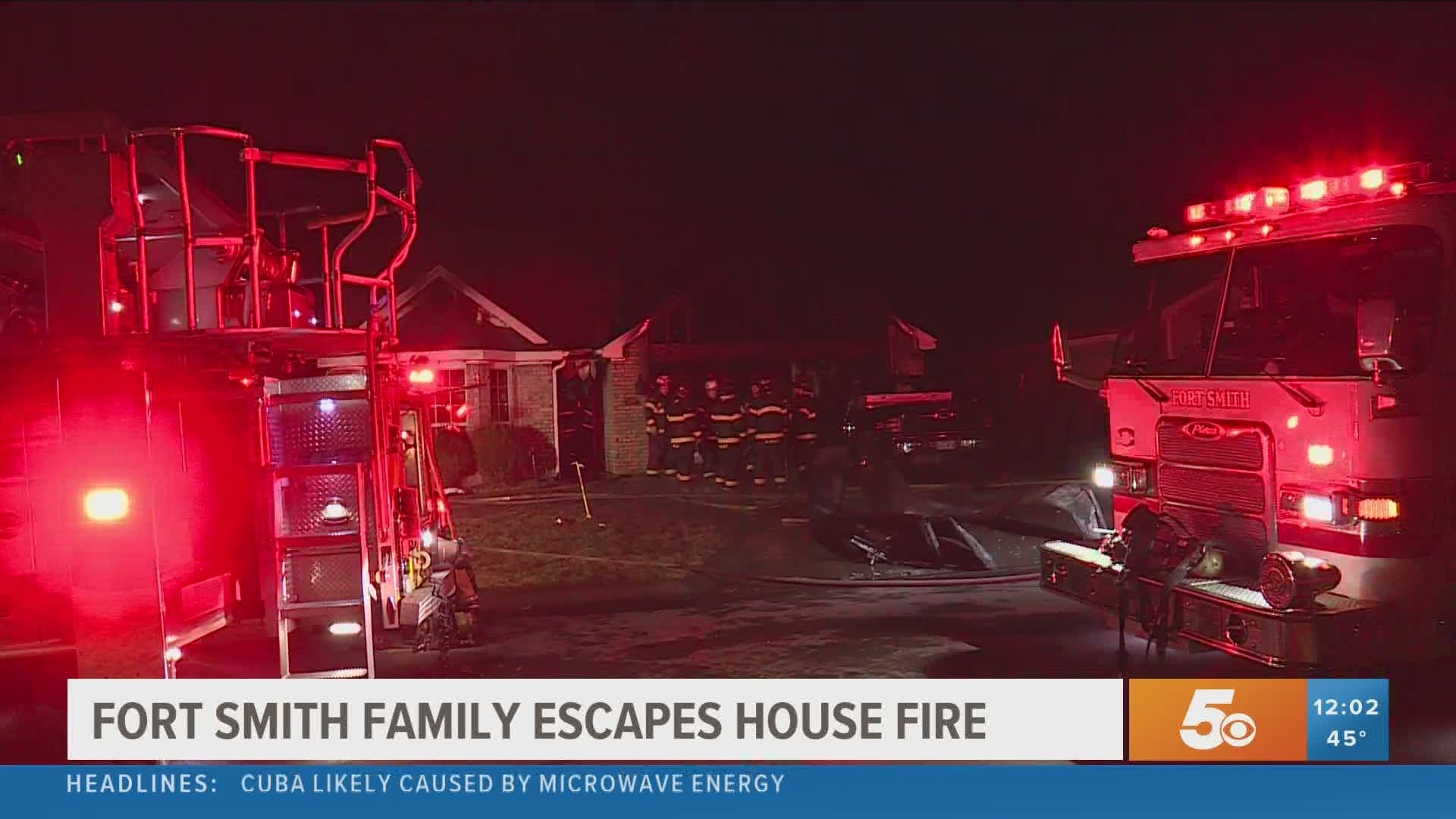 A Fort Smith man escaped from his home after an explosion and fire sparked by a space heater.