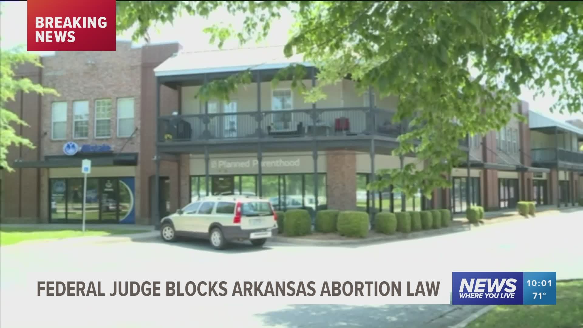 A federal judge on Tuesday blocked an Arkansas law banning nearly all abortions in the state while she hears a challenge to its constitutionality.