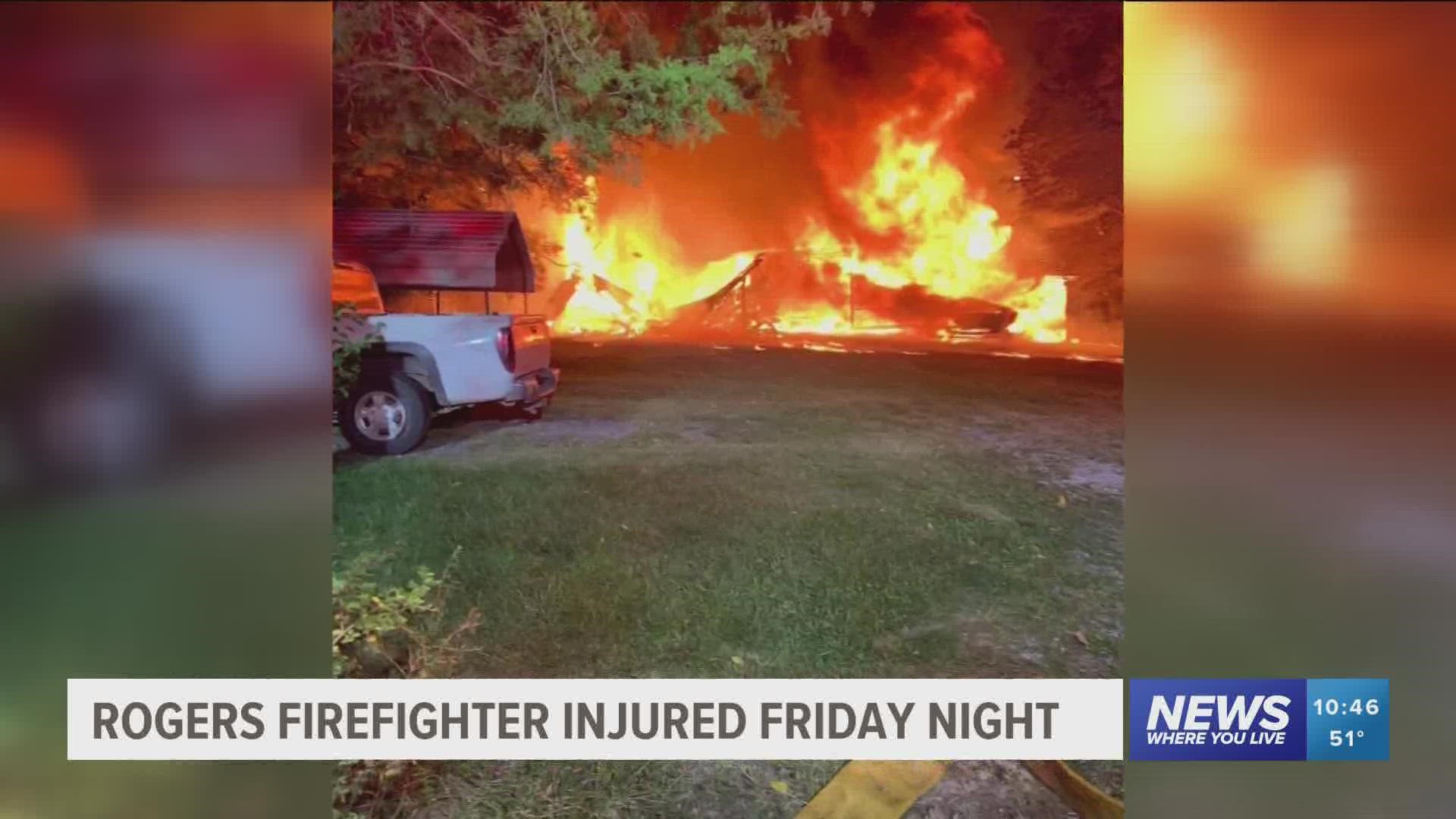 The Rogers Fire Department says one firefighter was injured and transported to a local hospital.