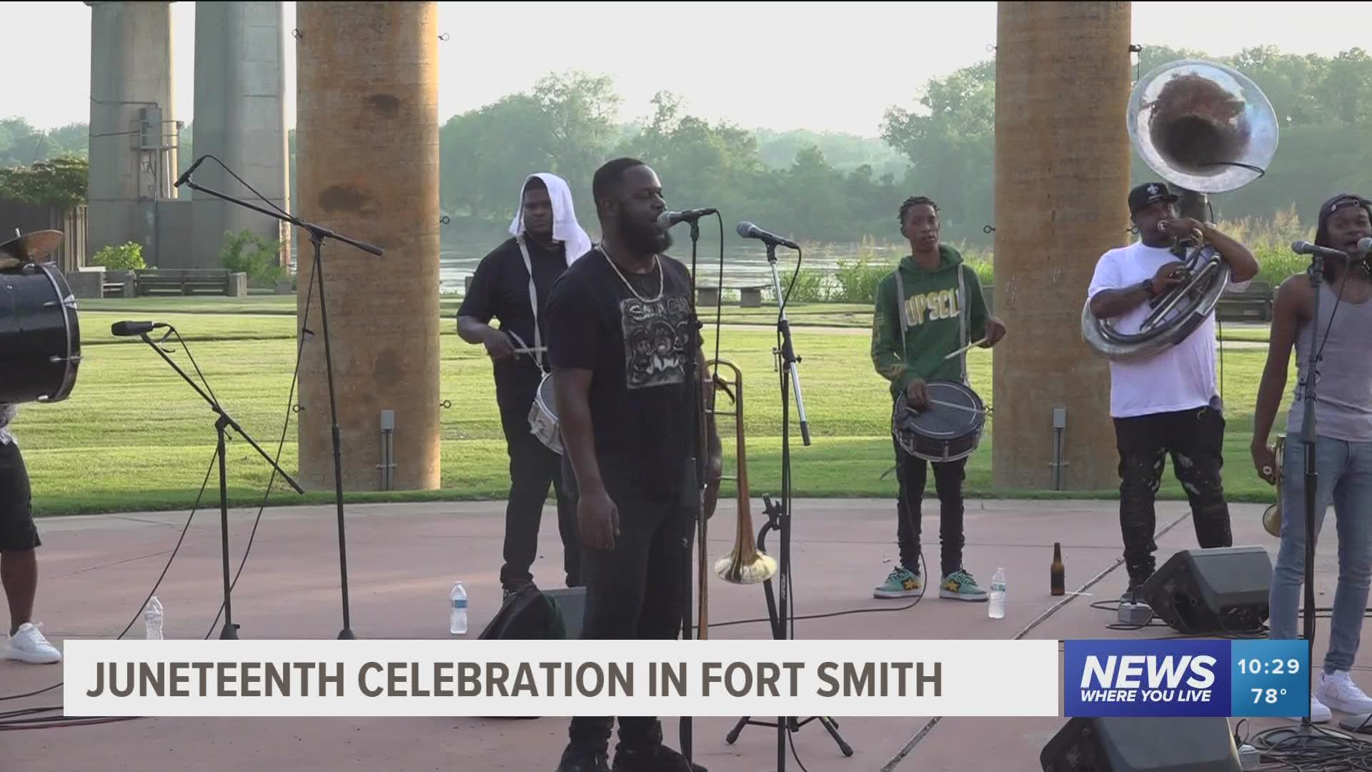 To celebrate Juneteenth, hundreds of people gathered at the Riverfront Amphitheater for a live music event hosted by 64.6 Downtown and the Fort Smith Round Table.