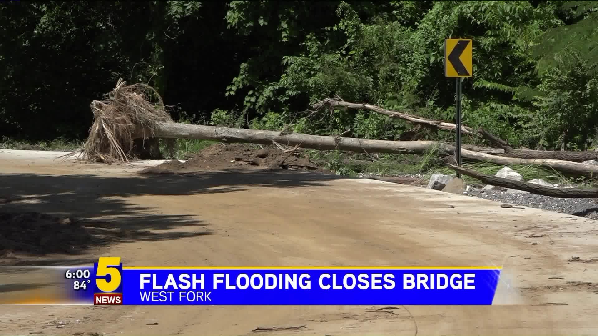 Flash Flooding Closes Bridge in West Fork