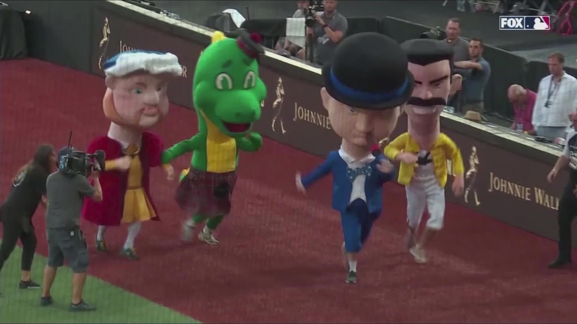 Great mascot race depicting English settlers ends in a tumble at MLB game.