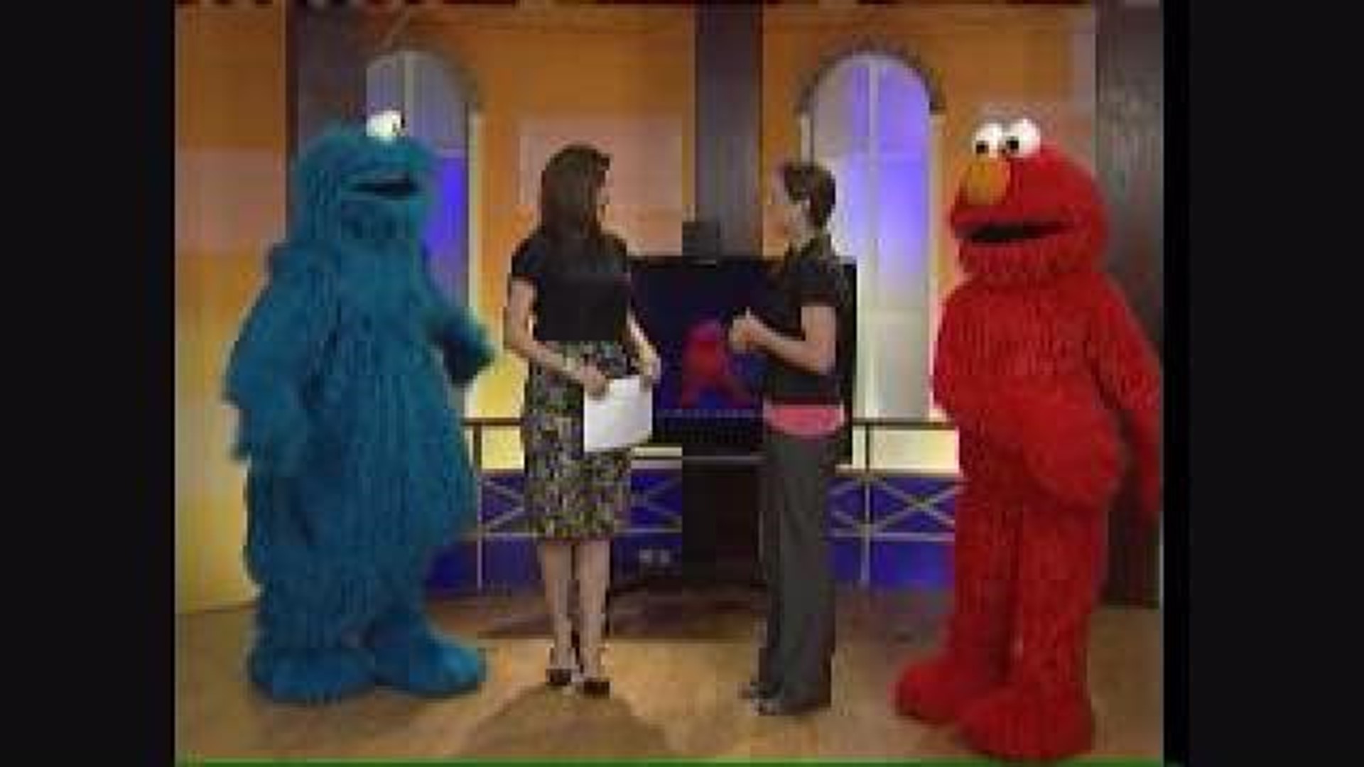 Elmo and Cookie Monster Visit 5NEWS Studio