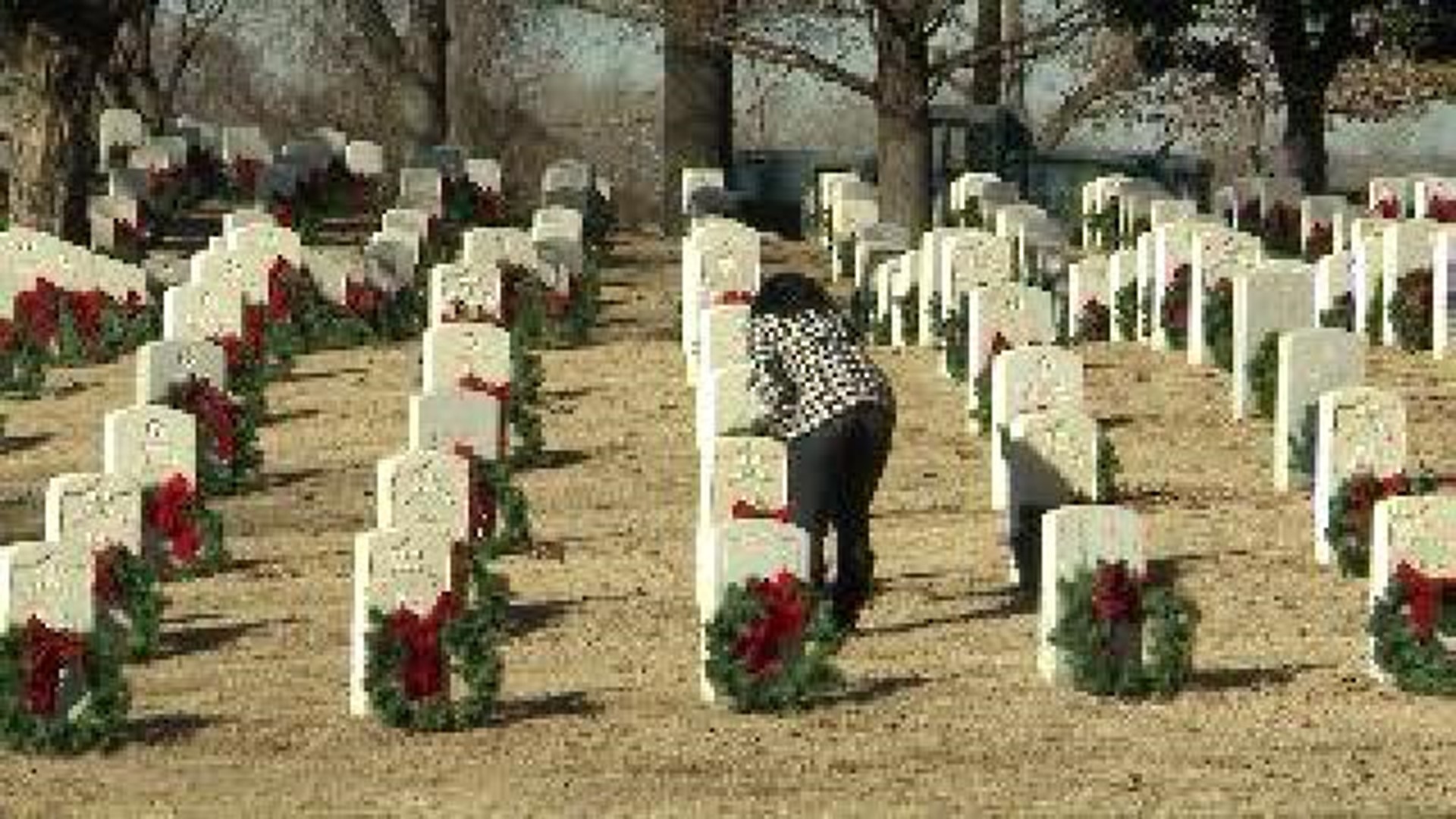 Community Replaces Wreaths at Cemetery After Storm
