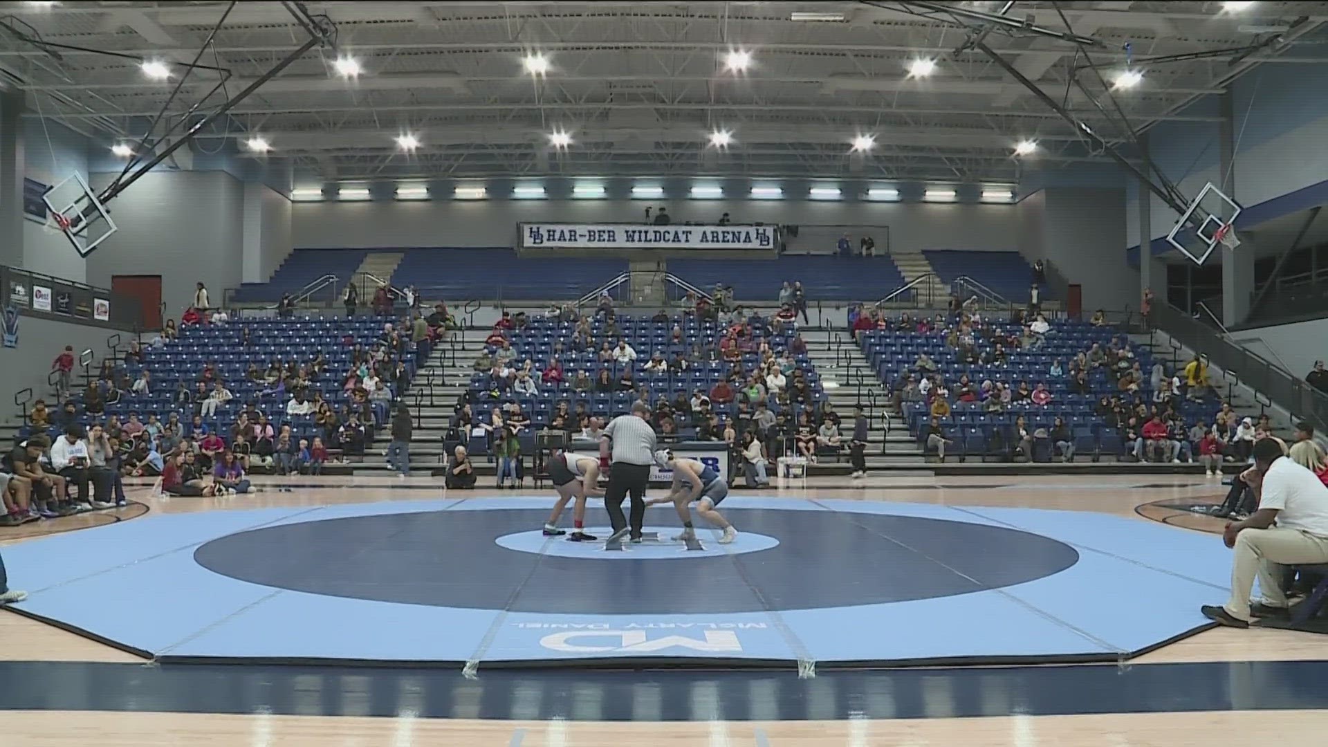 TONIGHT AT SPRINGDALE HAR-BER HIGH SCHOOL  .. THE WRESTLING PROGRAMS AT HAR-BER AND SPRINGDALE HIGH SCHOOL HELD A UNITE NIGHT TO BRING TOGETHER THE MARSHALESE COMMUN