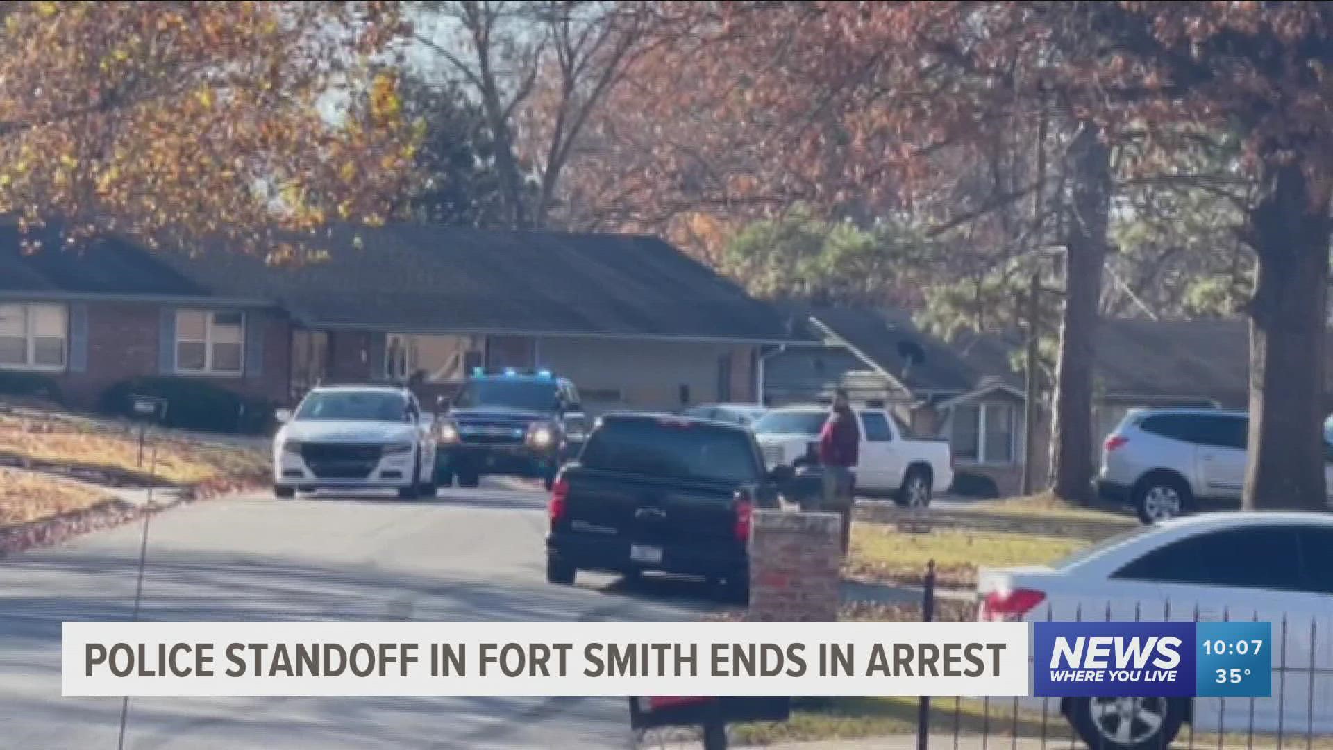 The standoff lasted about two hours before one man was taken into custody.