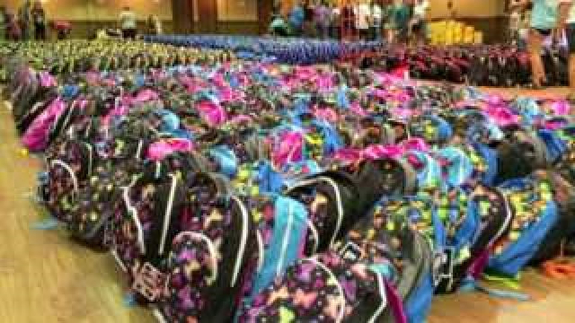 Harvest Time Church Filling Up Backpacks For Children In Need