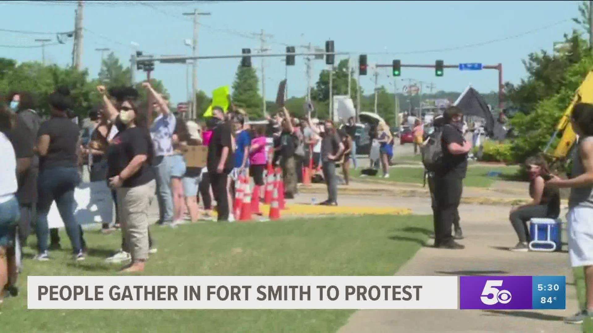 People gather in Fort Smith protest.