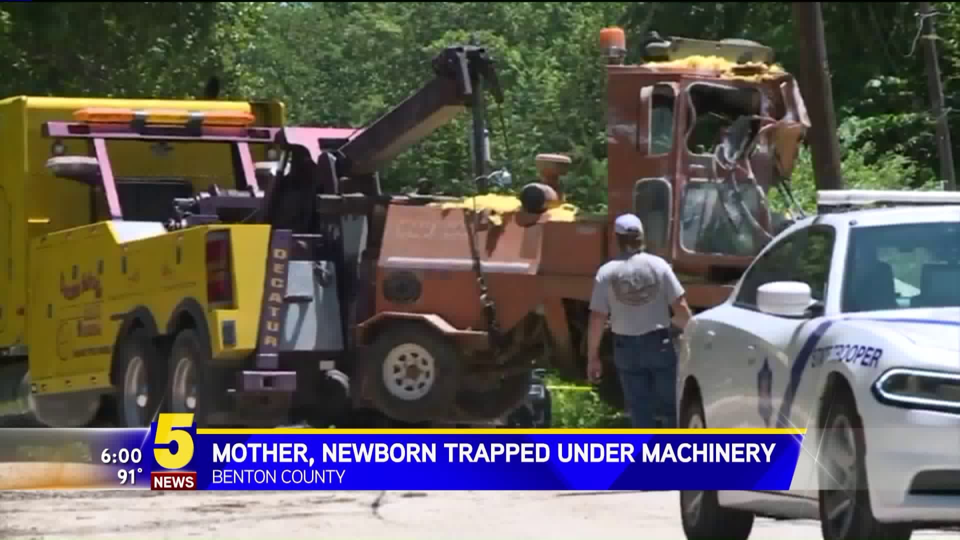 Mother, Newborn Trapped Under Machinery