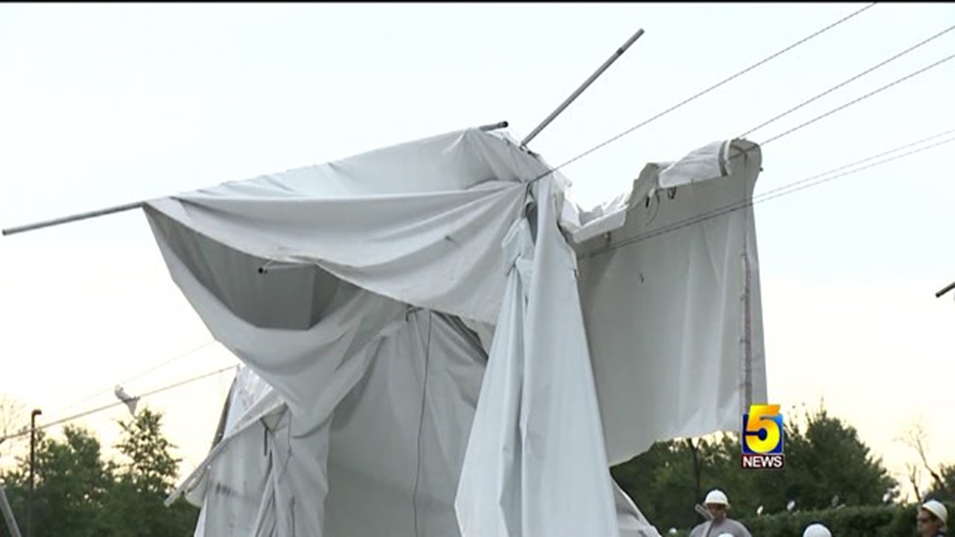 Winds Throw Tent On Power Lines