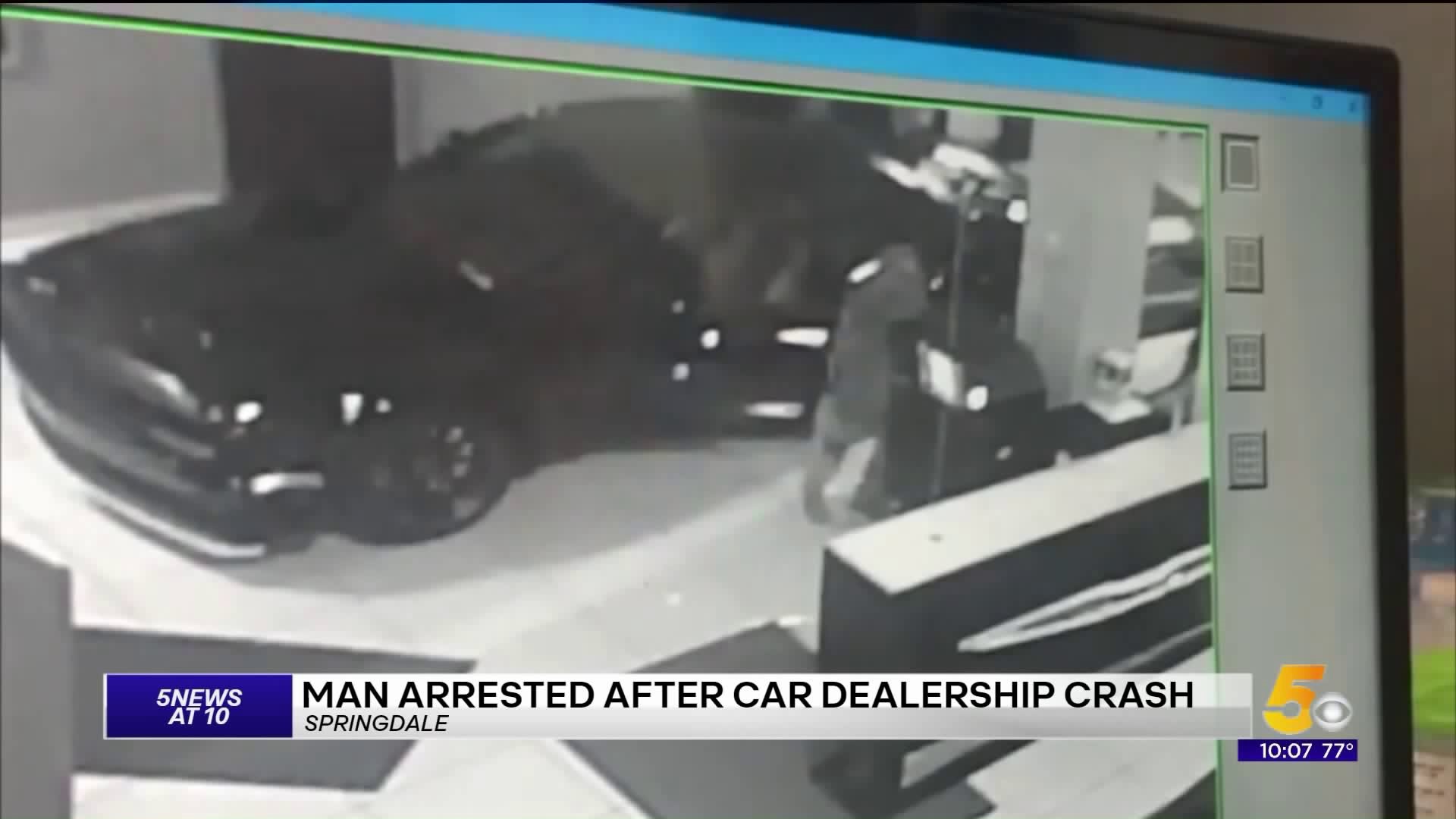 Man Arrested After Car Dealership Crash