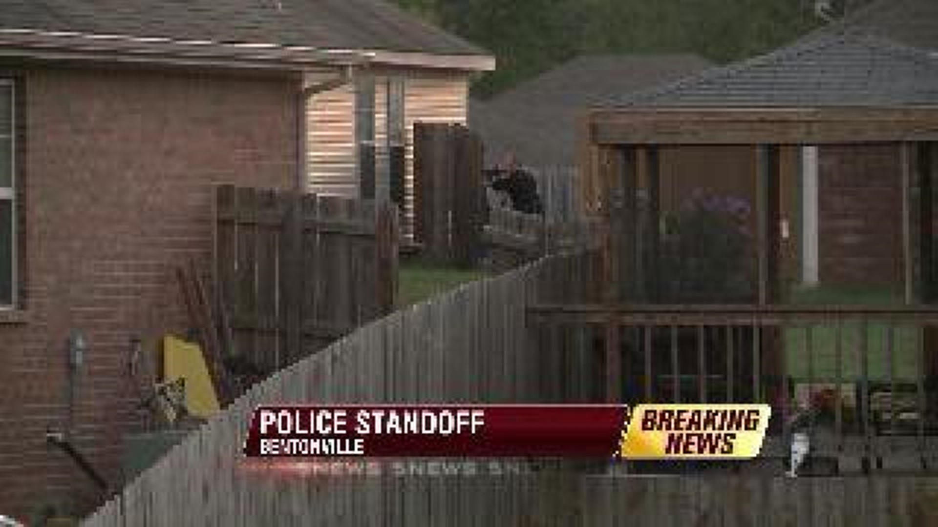 Police in Bentonville negotiate with an armed suspect inside a home