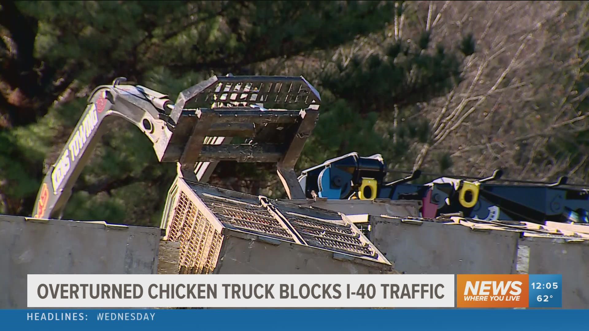 The semi tractor-trailer was hauling live chickens on I-40 when it overturned on the Exit 35 on-ramp near Ozark.
