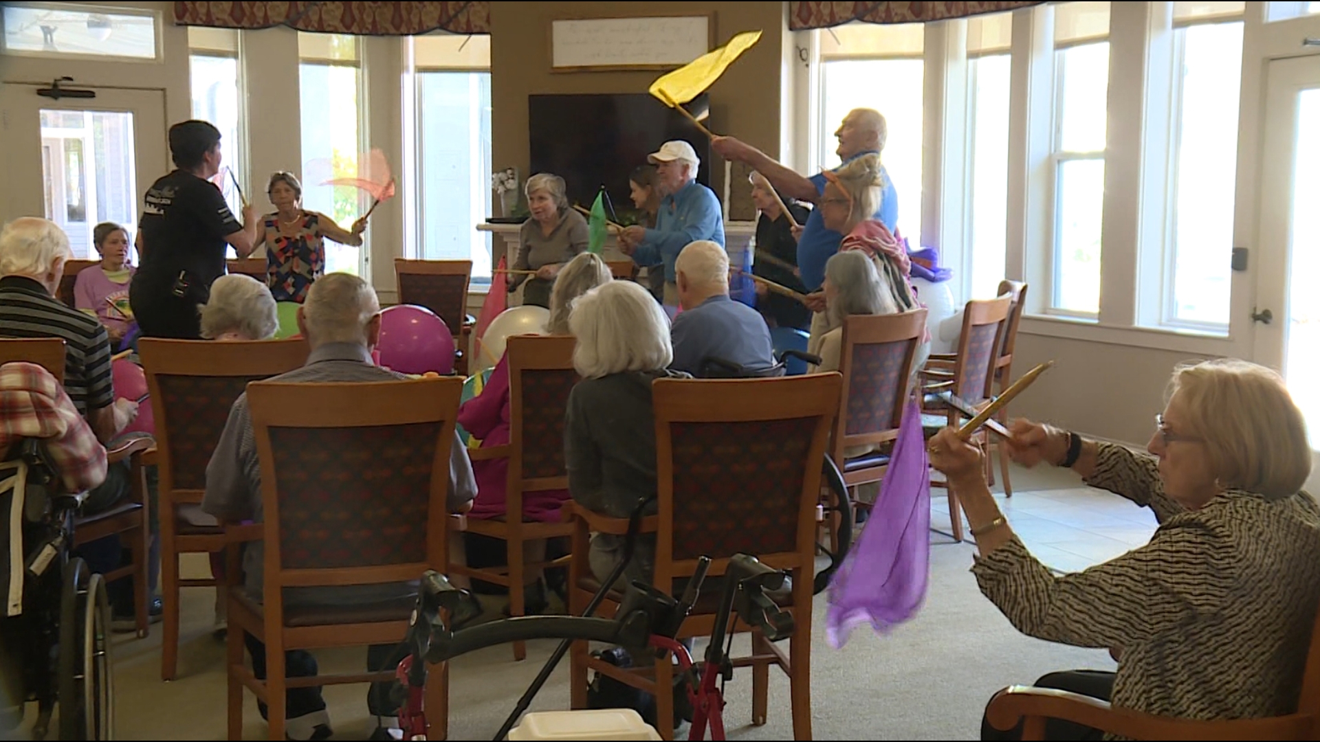 A drumming circle is a unique exercise program where residents at Clear Creek in Fayetteville use stability balls and and drum sticks to move to the music.