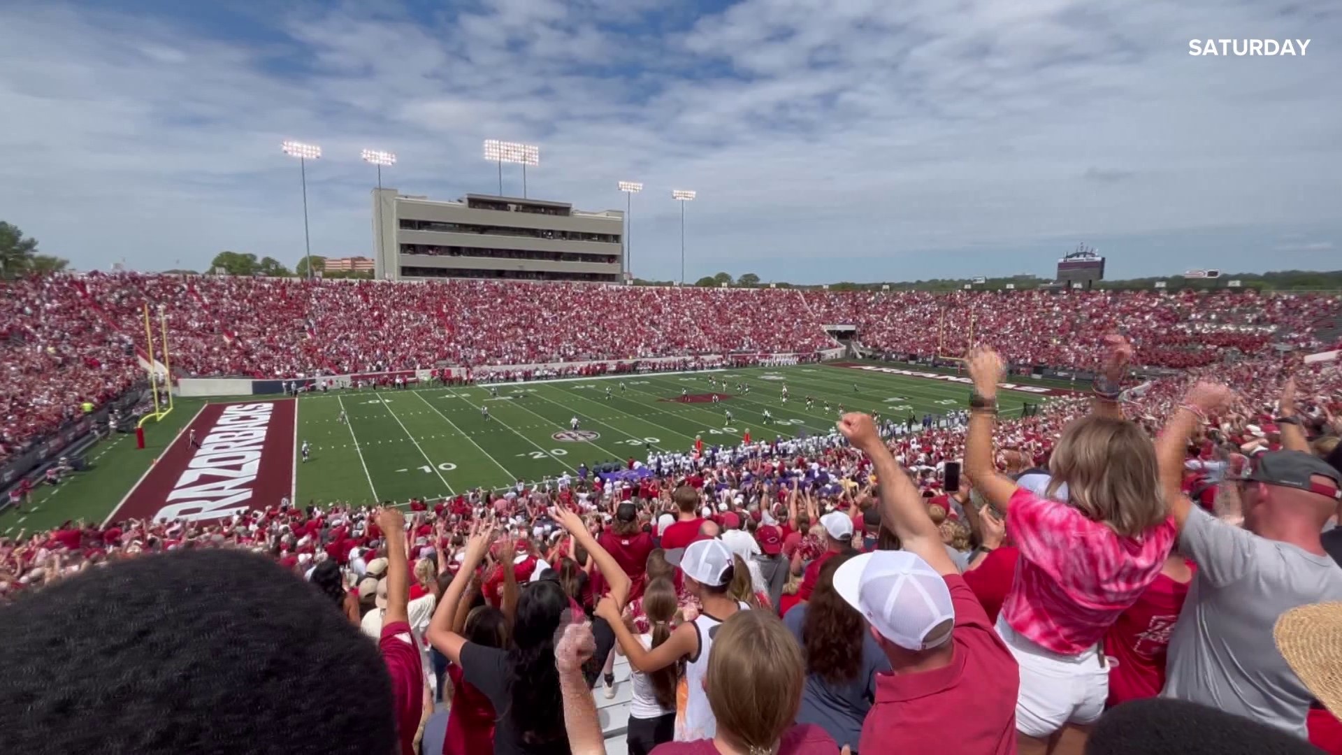 Razorback fans complained about long lines and lack of water at the stadium.