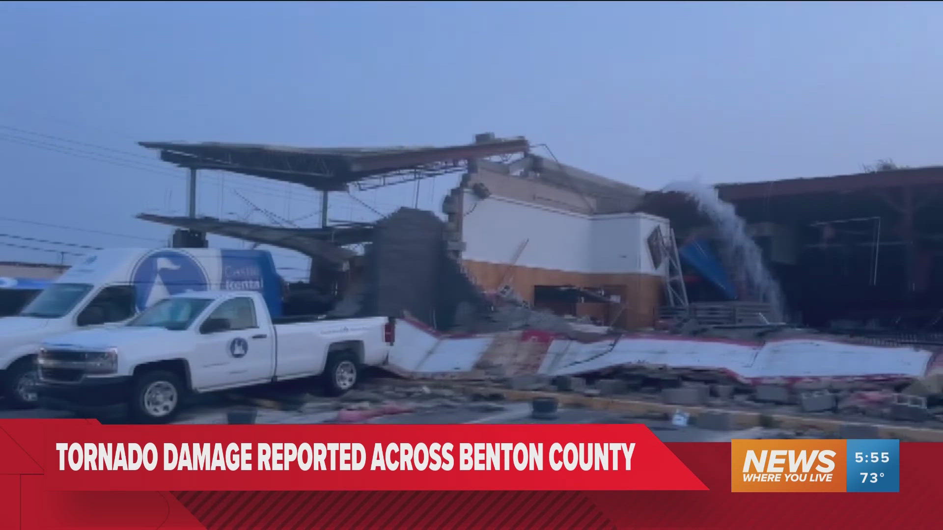 Water seen pouring out of business after possible tornado in Rogers