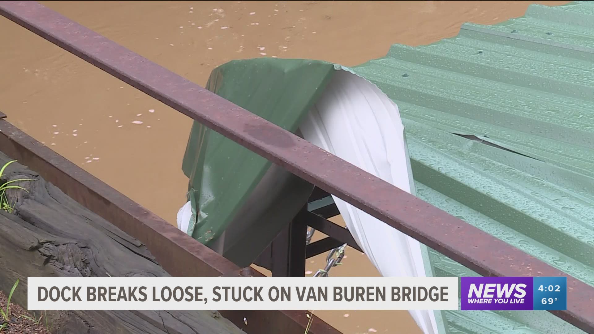 Dock breaks loose and gets stuck on Van Buren bridge