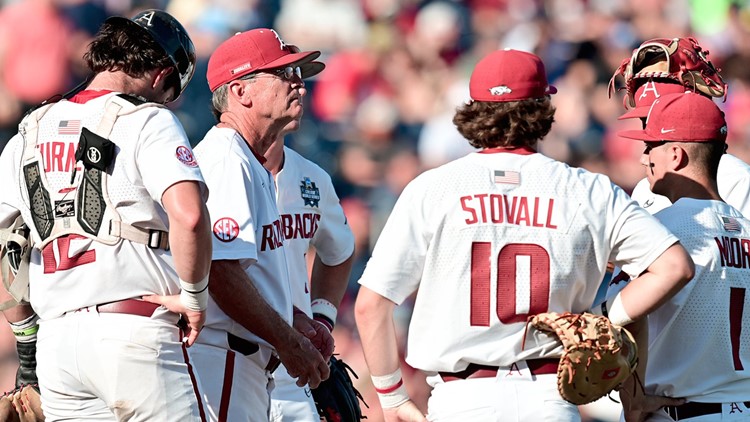 Razorbacks fall to Ole Miss 13-5, drop into losers' bracket at Men's College World Series.