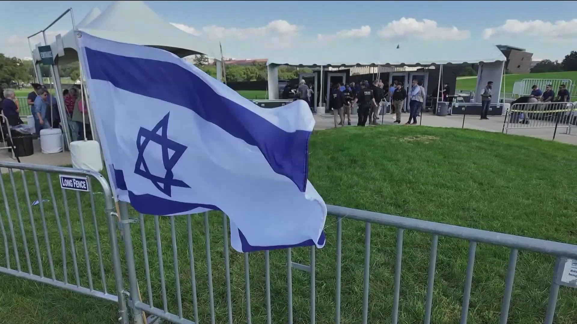 Family of hostages and protesters stood in silence in Jerusalem as a siren sounded.