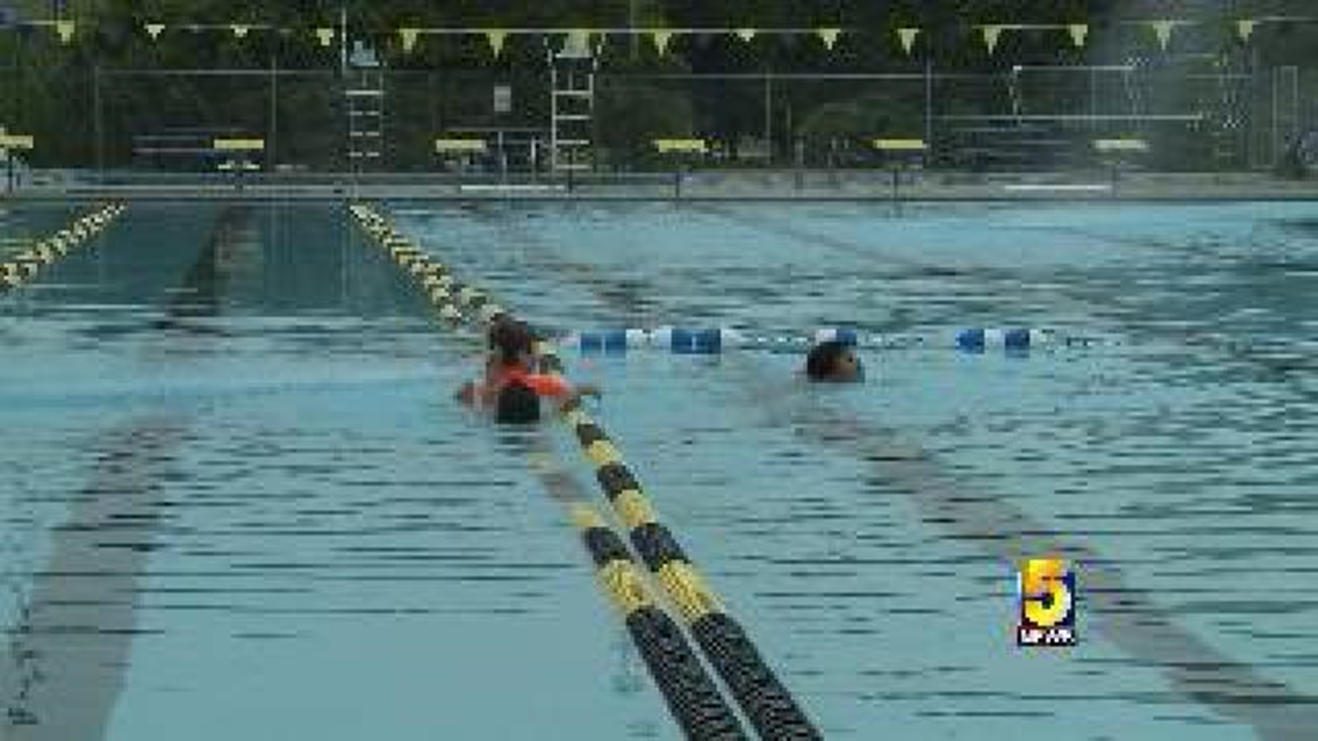 Retired Coach Teaches Swim Lessons