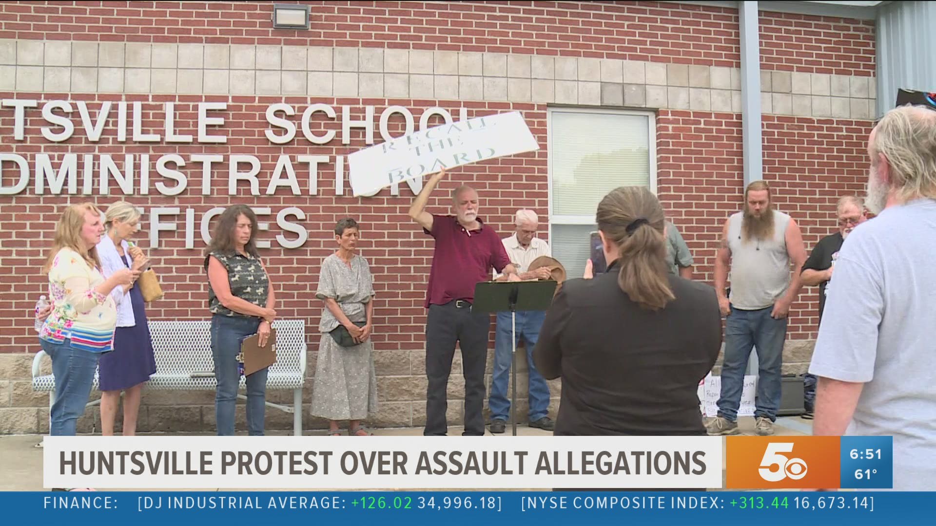 Protesters demanded answers from the school leaders who were accused of mishandling the alleged hazing incidents, which are being referred to as 'baptisms.'