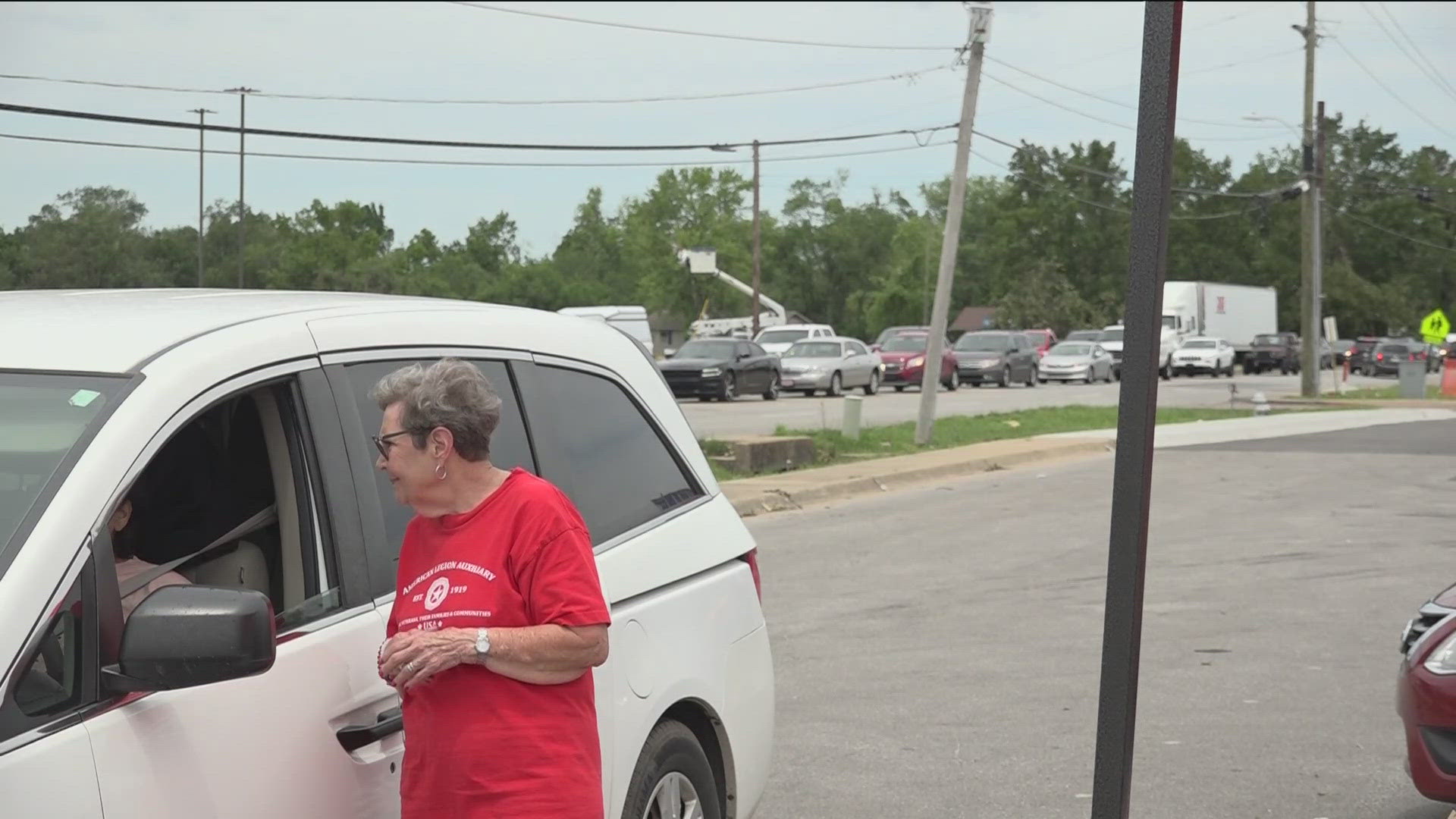 Members of the American Legion Auxiliary passed out sandwiches to those impacted by severe weather damage.