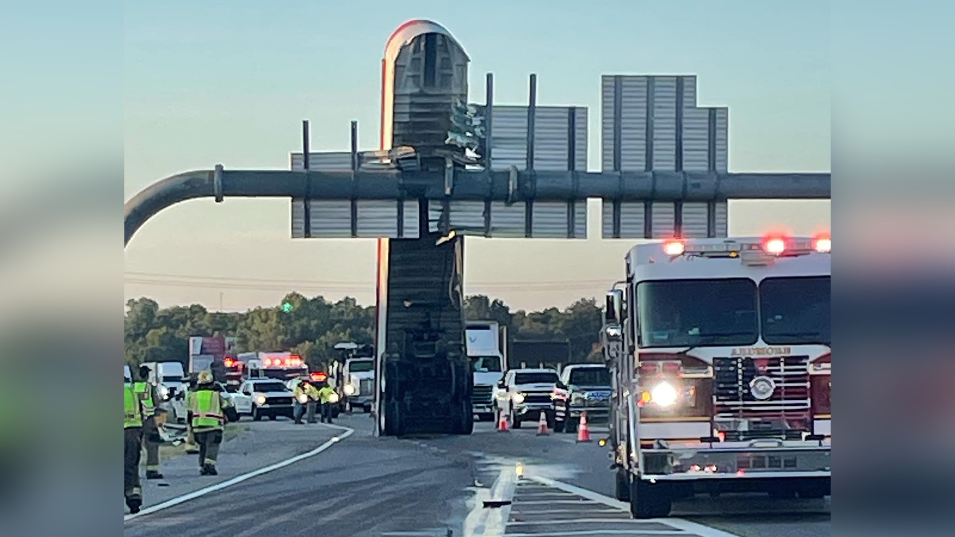 Oklahoma Highway Patrol reportedly had to call a crew with a crane to get the trailer down.