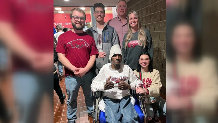 Razorback superfan's doctors surprise him with tickets to his first ever game