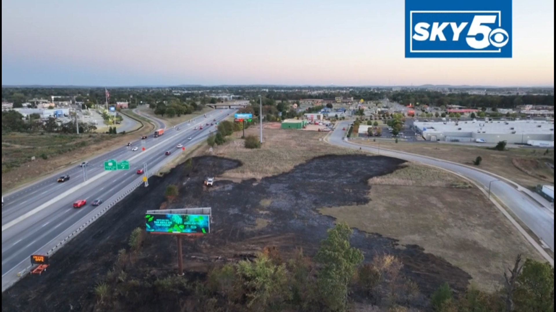 The grass fire stalled traffic for around two hours on Oct. 7 and spread to nearby structures.