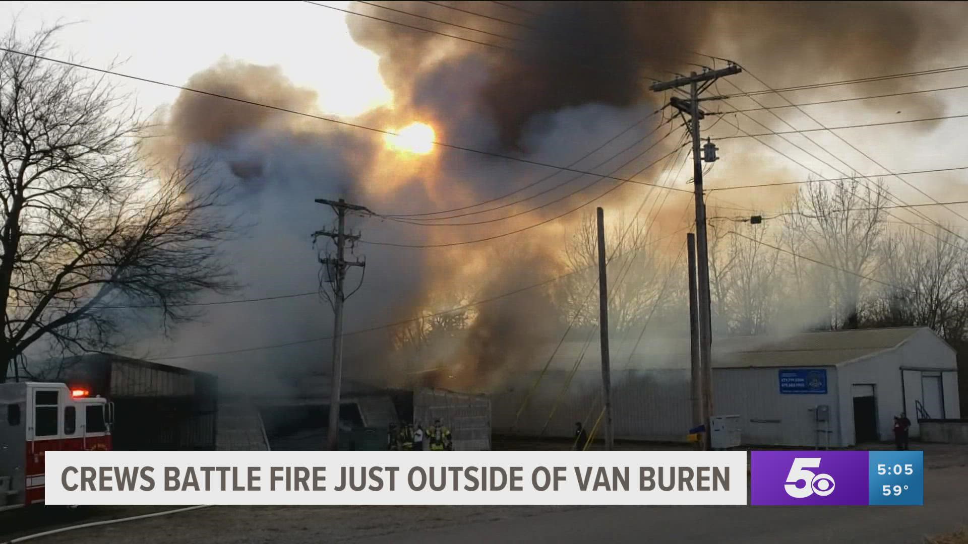 Fire crews battled a structure fire today, just outside of Van Buren.