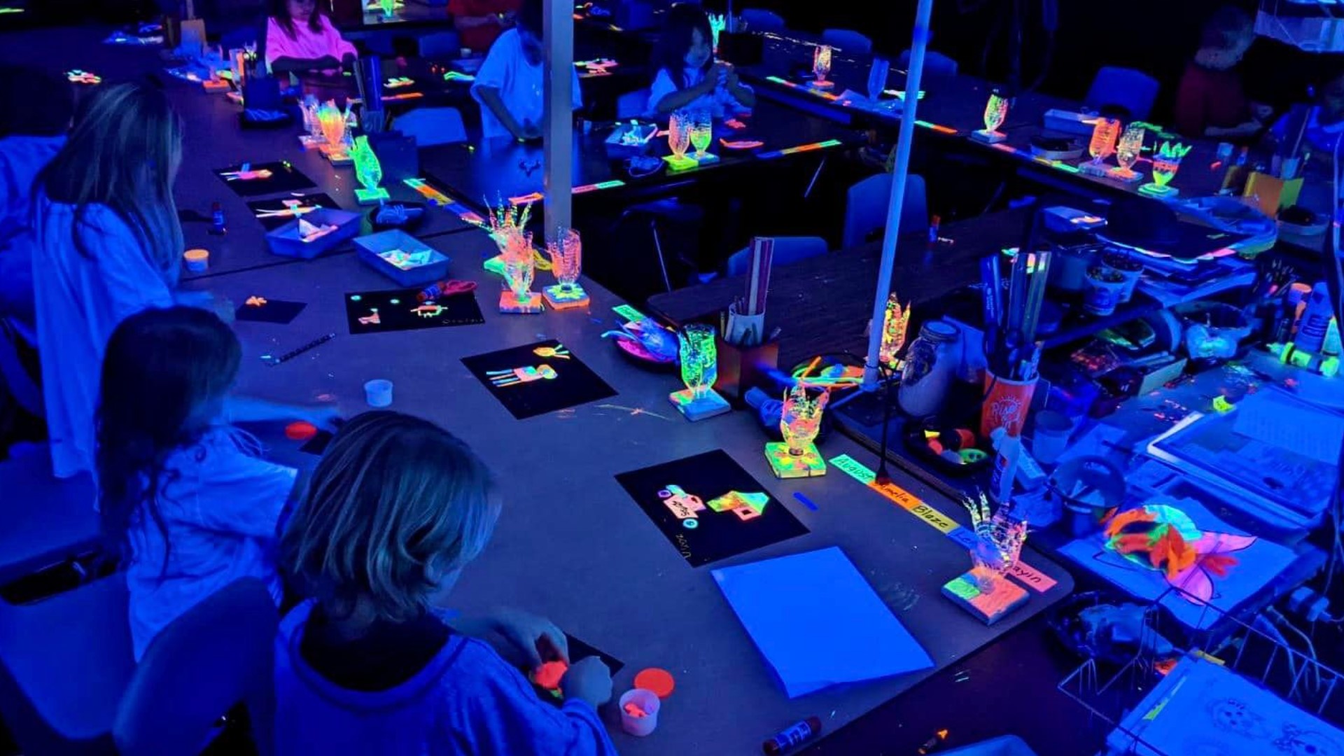 Students at First Lutheran school in Fort Smith spent several weeks designing a black light art display