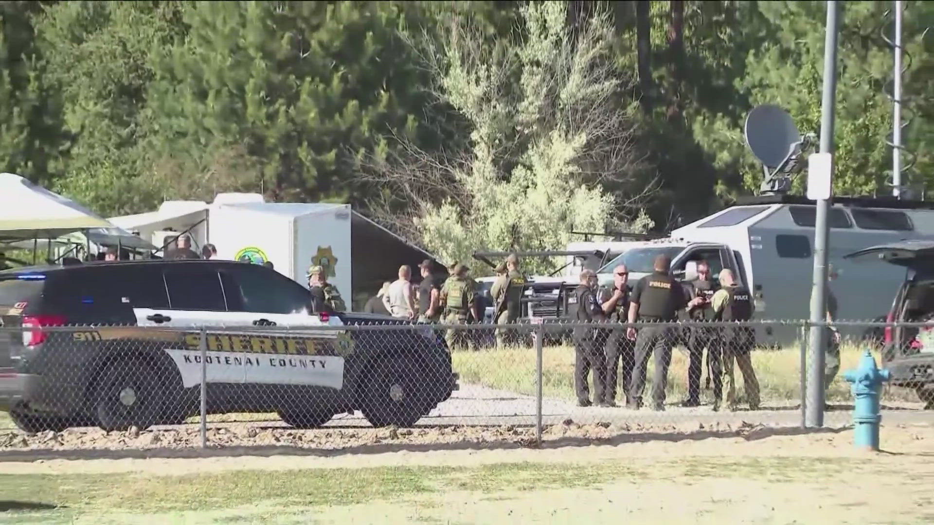 Two firefighters were killed Sunday and another was wounded when they were ambushed by sniper fire while responding to a blaze in a northern Idaho mountain community