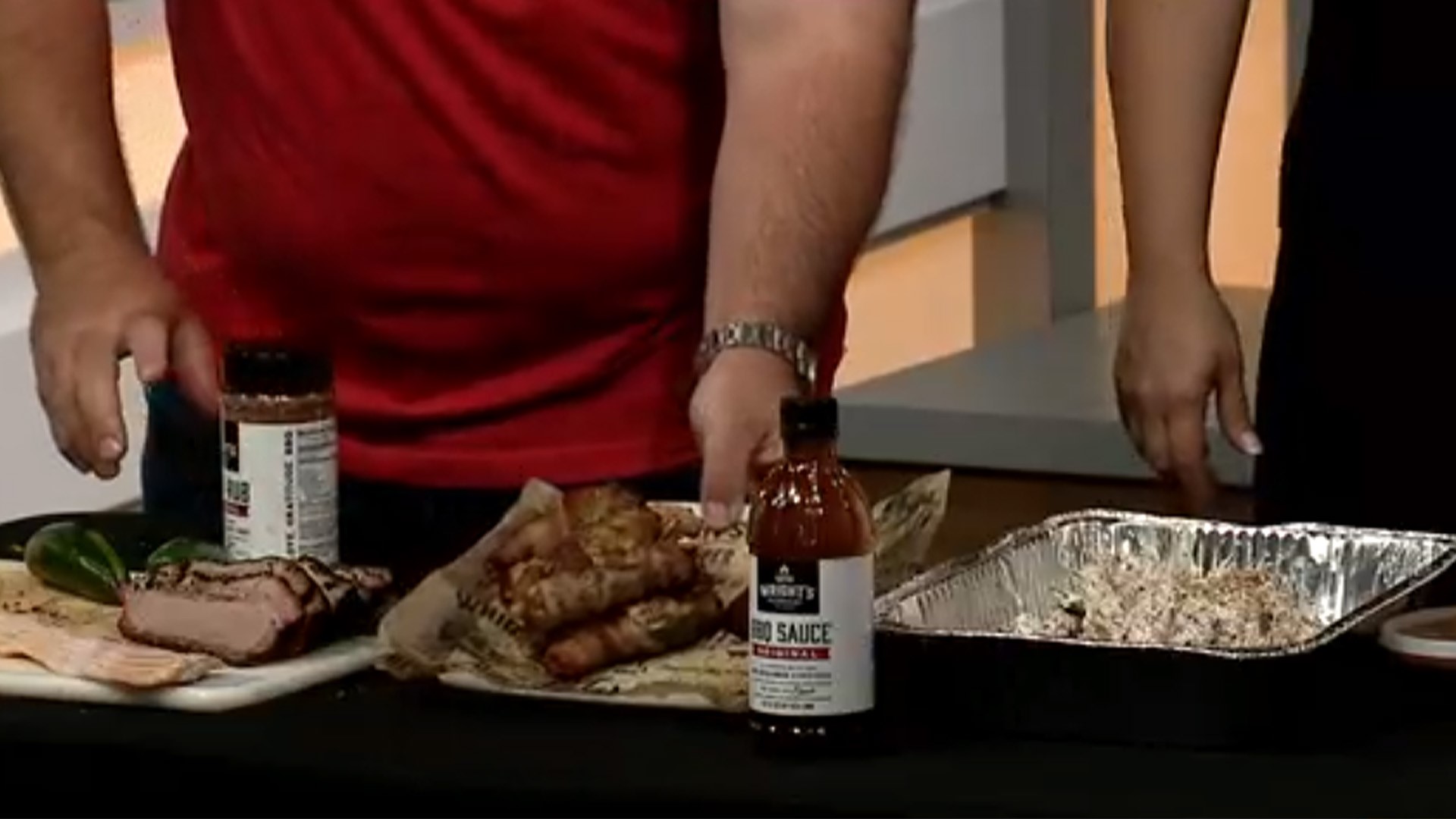 Jo Ellison and Zac Scott fire up early in the morning with Wright's Barbecue's jalapeno poppers.