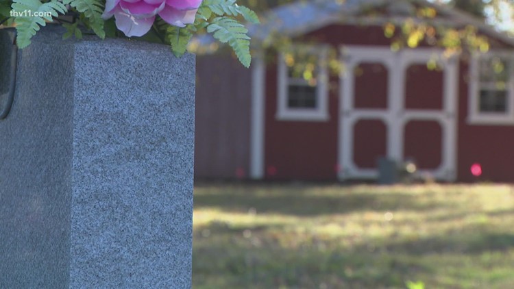 Man places shed in an Arkansas cemetery, attempts living there