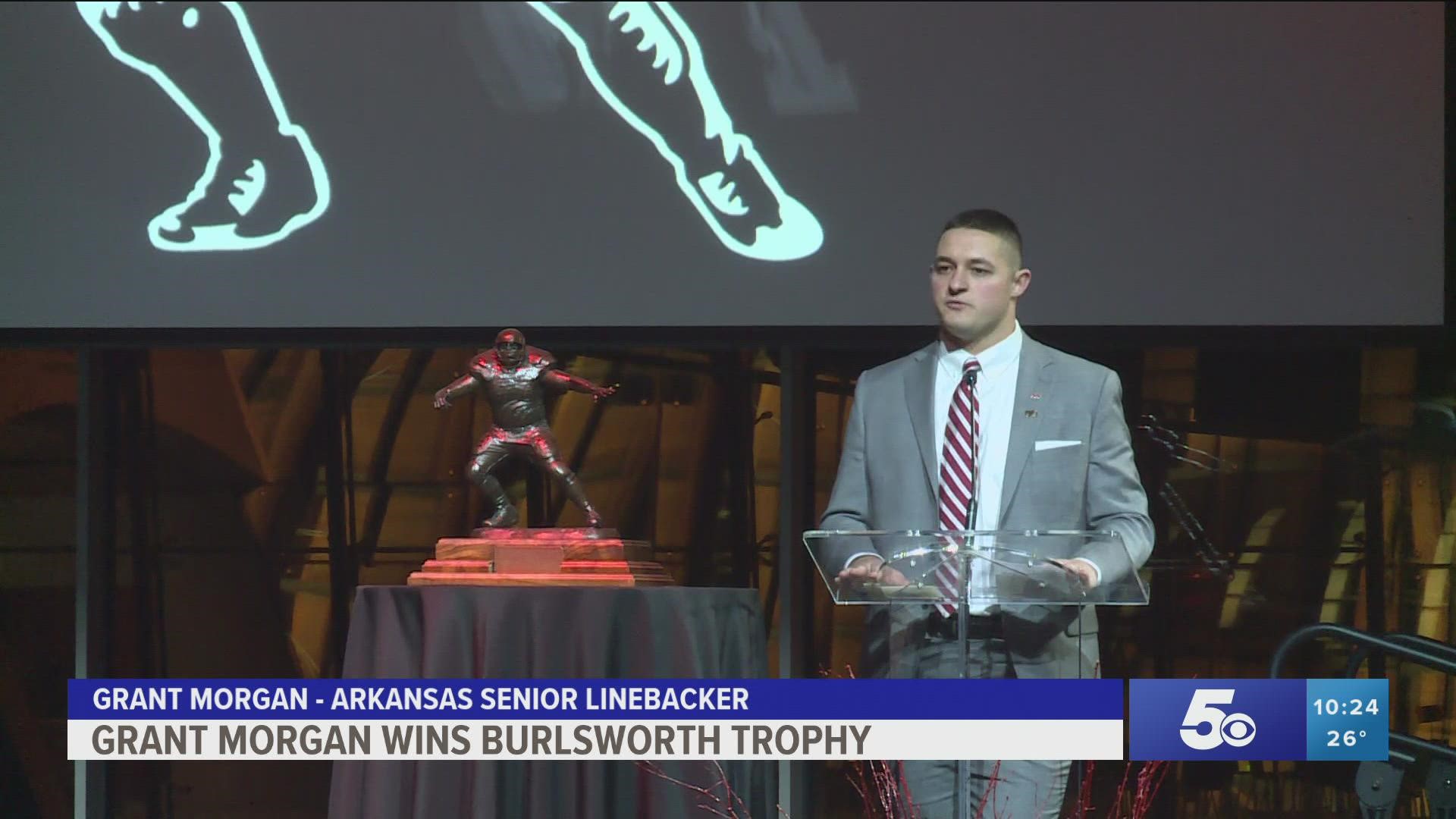 Morgan becomes first Razorback to win award for nation's top college football player who started career as a walk-on.